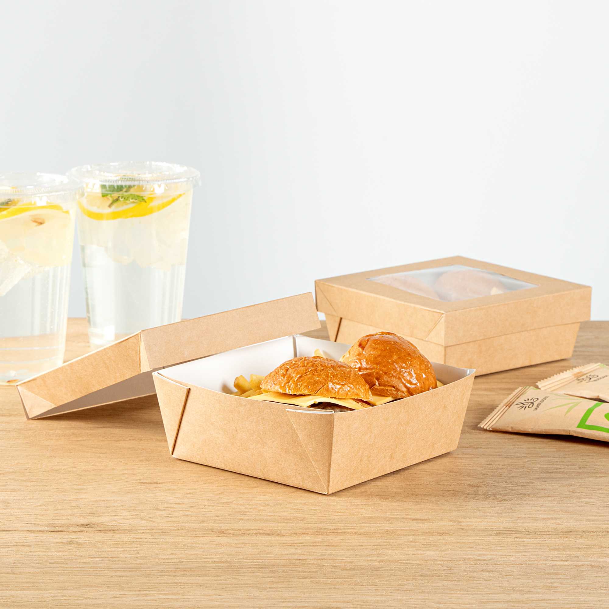 Cafe Vision 27 oz Square Kraft Paper Medium Take Out Container - 5 1/4" x 5 1/4" x 2" - 25 count box