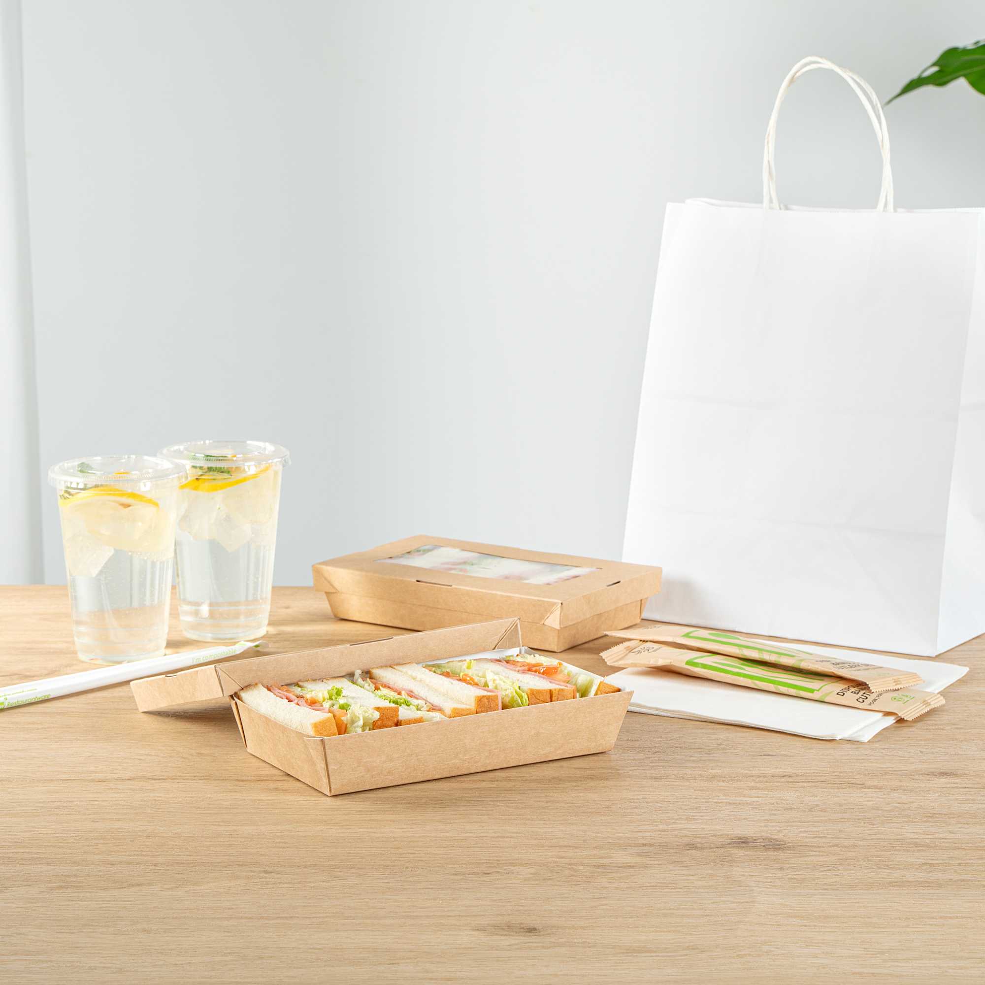 Cafe Vision 34 oz Rectangle Kraft Paper Large Take Out Container - 8 1/2" x 5 1/4" x 1 1/2" - 25 count box