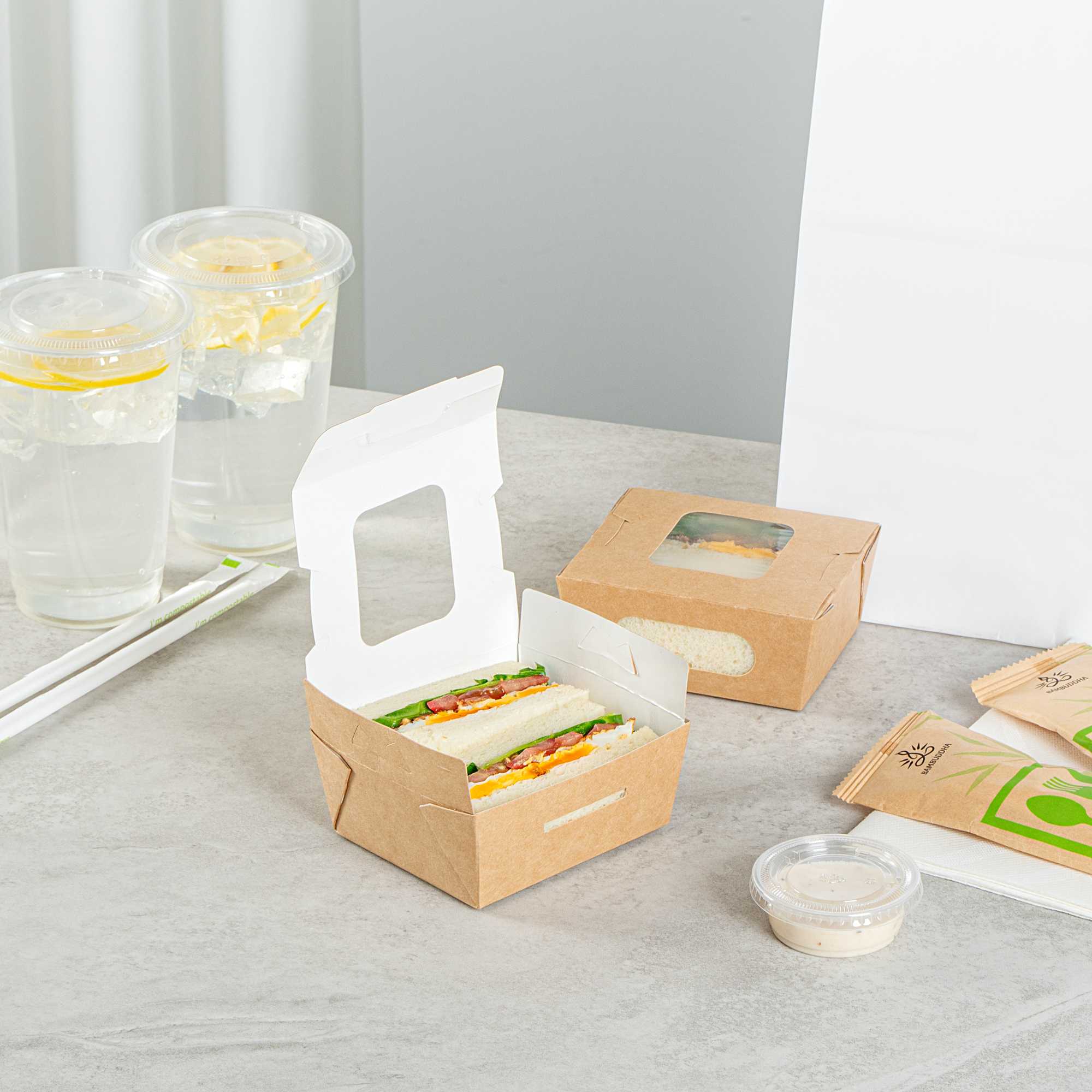 Cafe Vision 12 oz Rectangle Kraft Paper Mini Bio Take Out Container - Two Windows - 4 1/4" x 3 3/4" x 1 3/4" - 50 count box