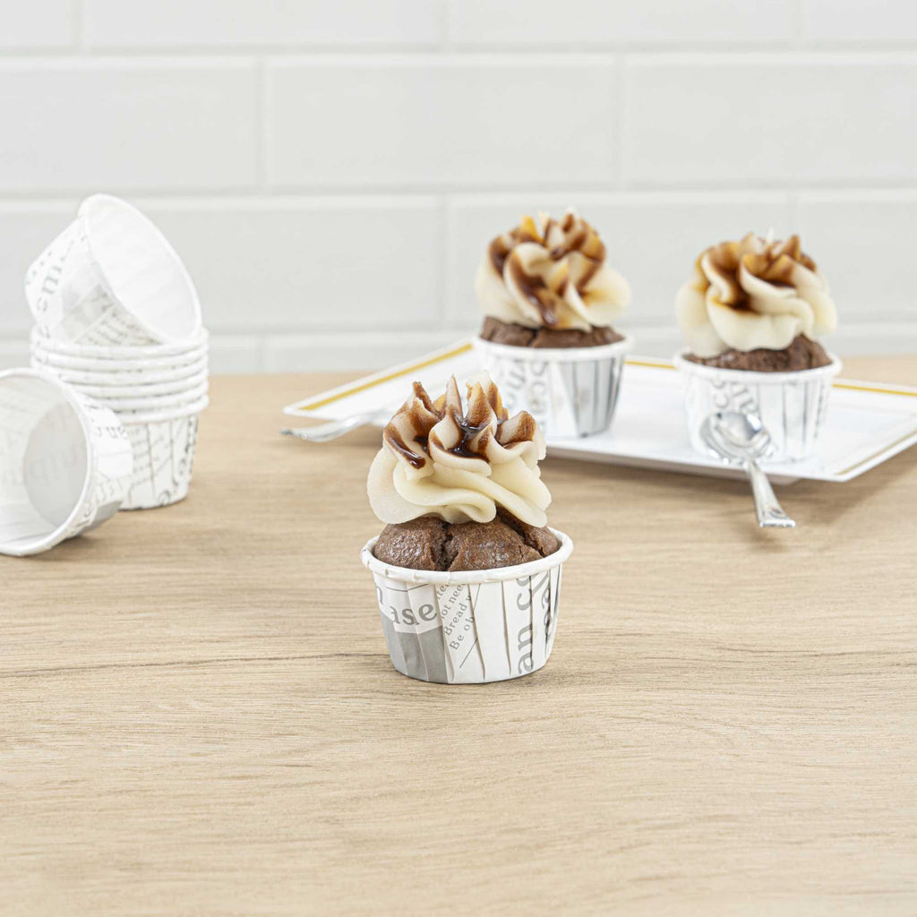 Panificio 1 oz Round Newsprint Paper Small Baking Cup - Pleated - 2" x 2" x 1 1/4" - 200 count box