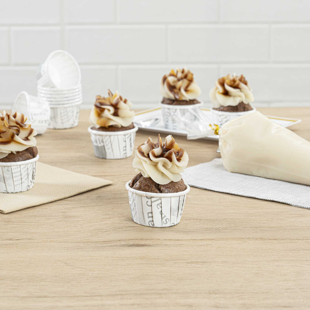 Panificio 1 oz Round Newsprint Paper Small Baking Cup - Pleated - 2" x 2" x 1 1/4" - 200 count box