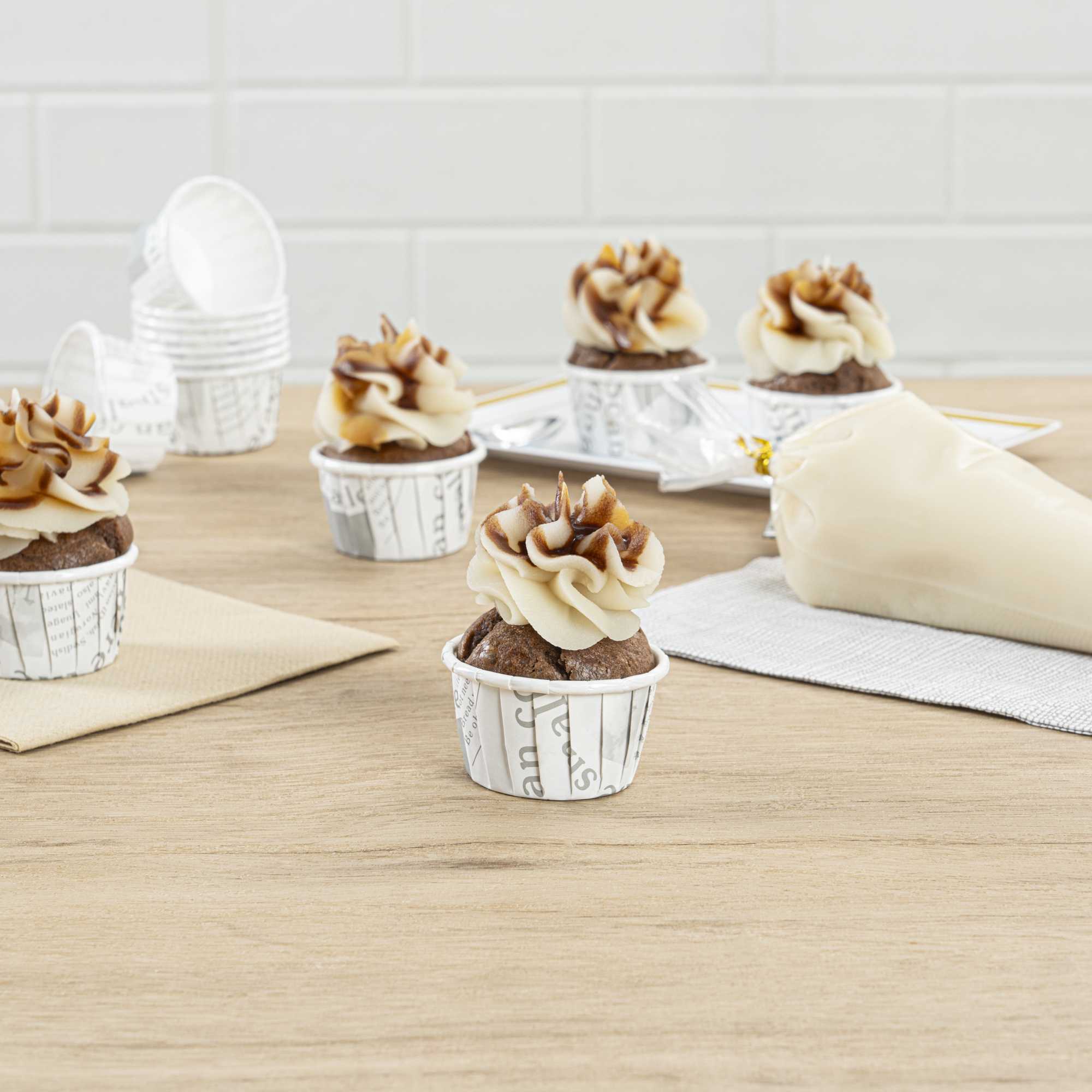 Panificio 1 oz Round Newsprint Paper Small Baking Cup - Pleated - 2" x 2" x 1 1/4" - 200 count box