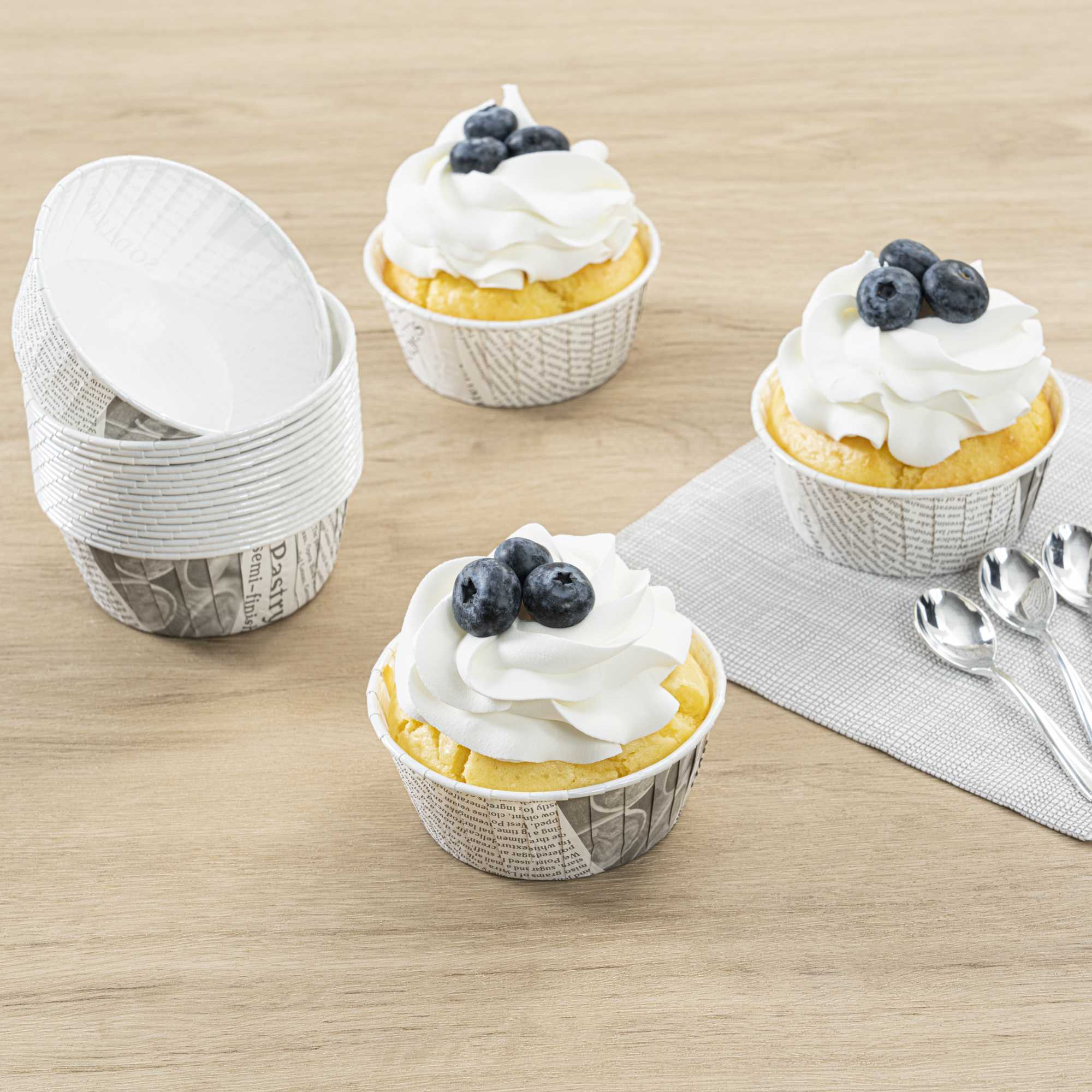 Panificio 5 oz Round Newsprint Paper Large Baking Cup - Pleated - 3 3/4" x 3 3/4" x 1 1/2" - 200 count box