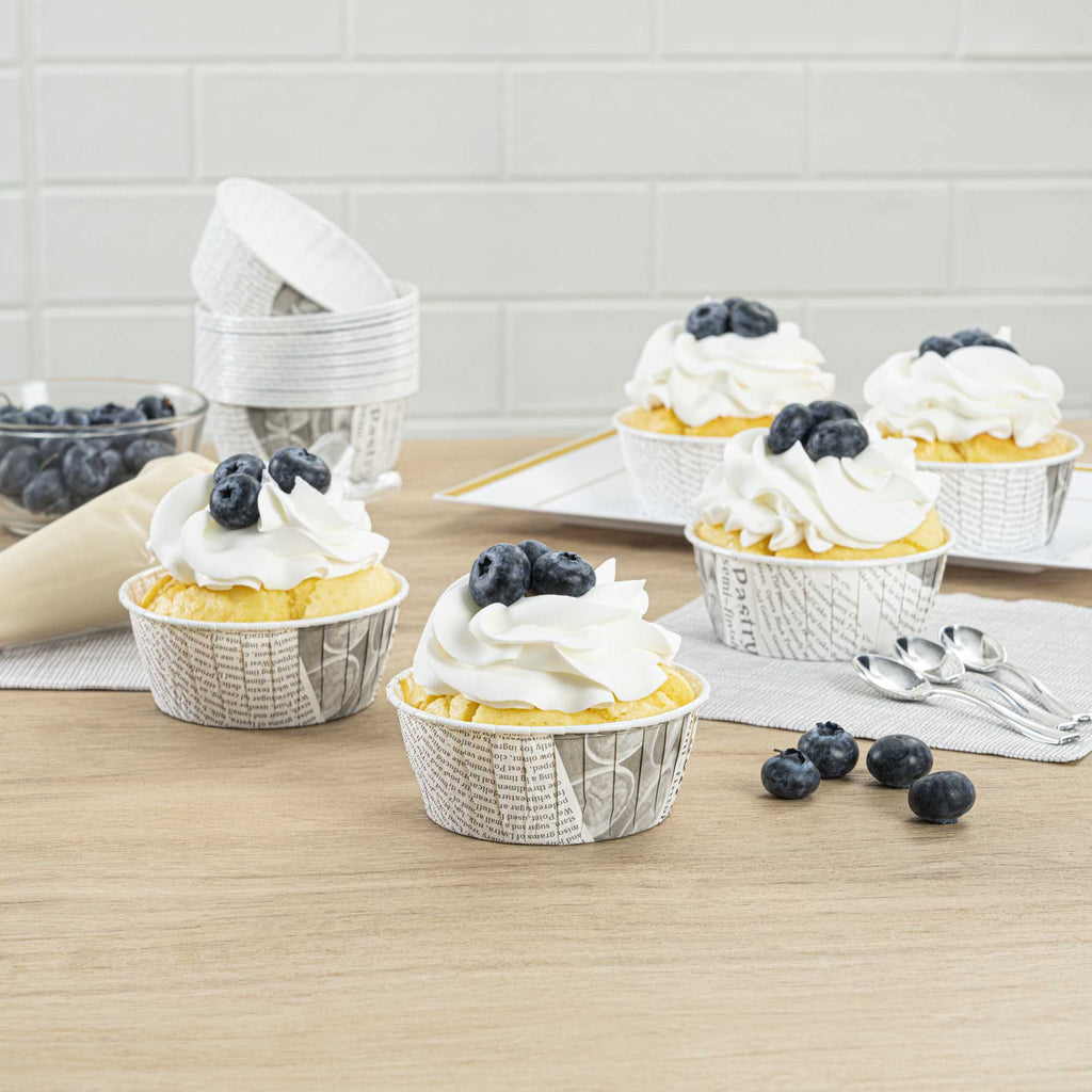 Panificio 5 oz Round Newsprint Paper Large Baking Cup - Pleated - 3 3/4" x 3 3/4" x 1 1/2" - 200 count box