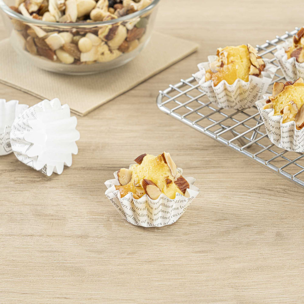 Panificio 0.4 oz Round Newsprint Paper Mini Baking Cup - Flared - 2" x 2" x 1/2" - 200 count box