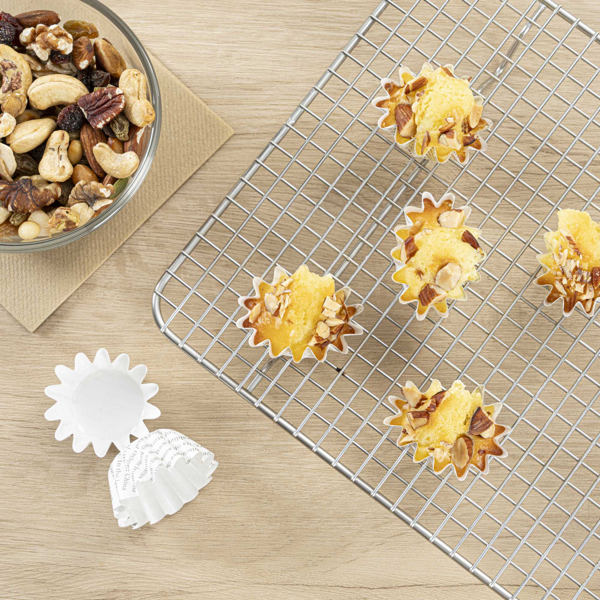 Panificio 0.4 oz Round Newsprint Paper Mini Baking Cup - Flared - 2" x 2" x 1/2" - 200 count box