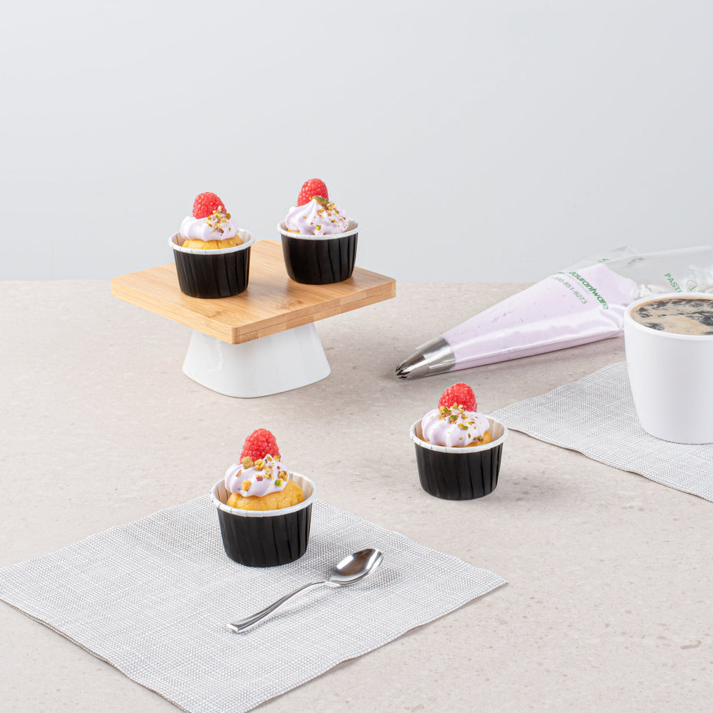 Panificio 2 oz Round Black Paper Medium Baking Cup - Pleated - 2 1/4" x 2 1/4" x 1 1/2" - 200 count box
