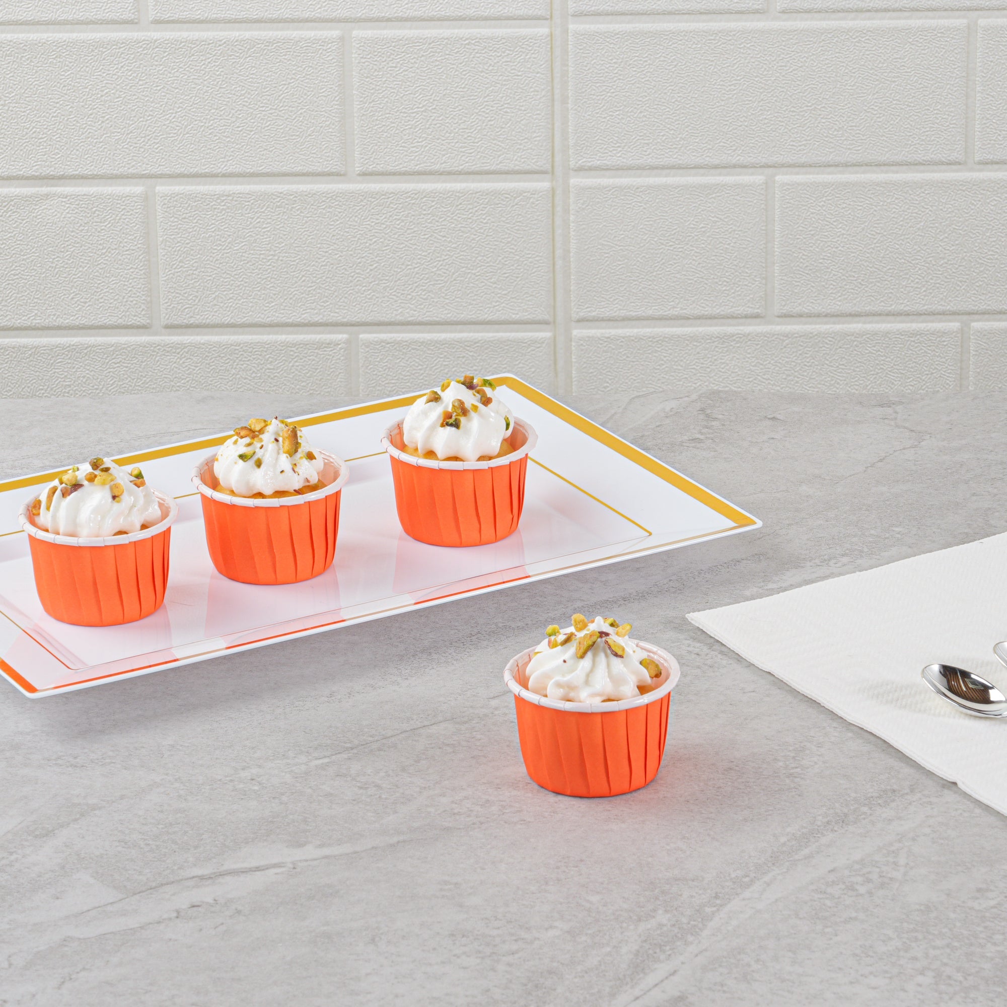 Panificio 2 oz Round Tangerine Orange Paper Medium Baking Cup - Pleated - 2 1/4" x 2 1/4" x 1 1/2" - 200 count box