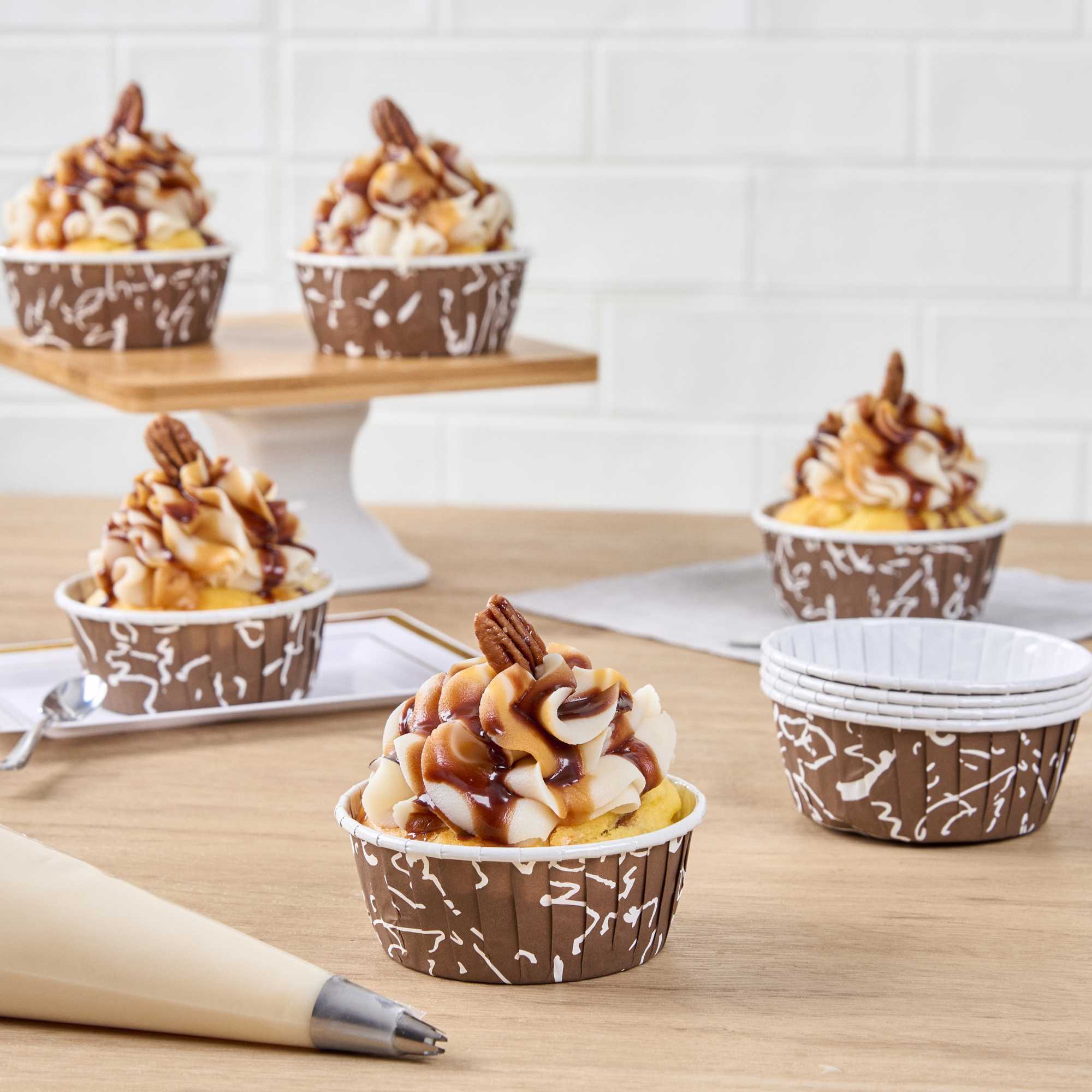 Panificio 5 oz Round Chocolate Wisp Paper Large Baking Cup - Pleated - 3 3/4" x 3 3/4" x 1 1/2" - 200 count box