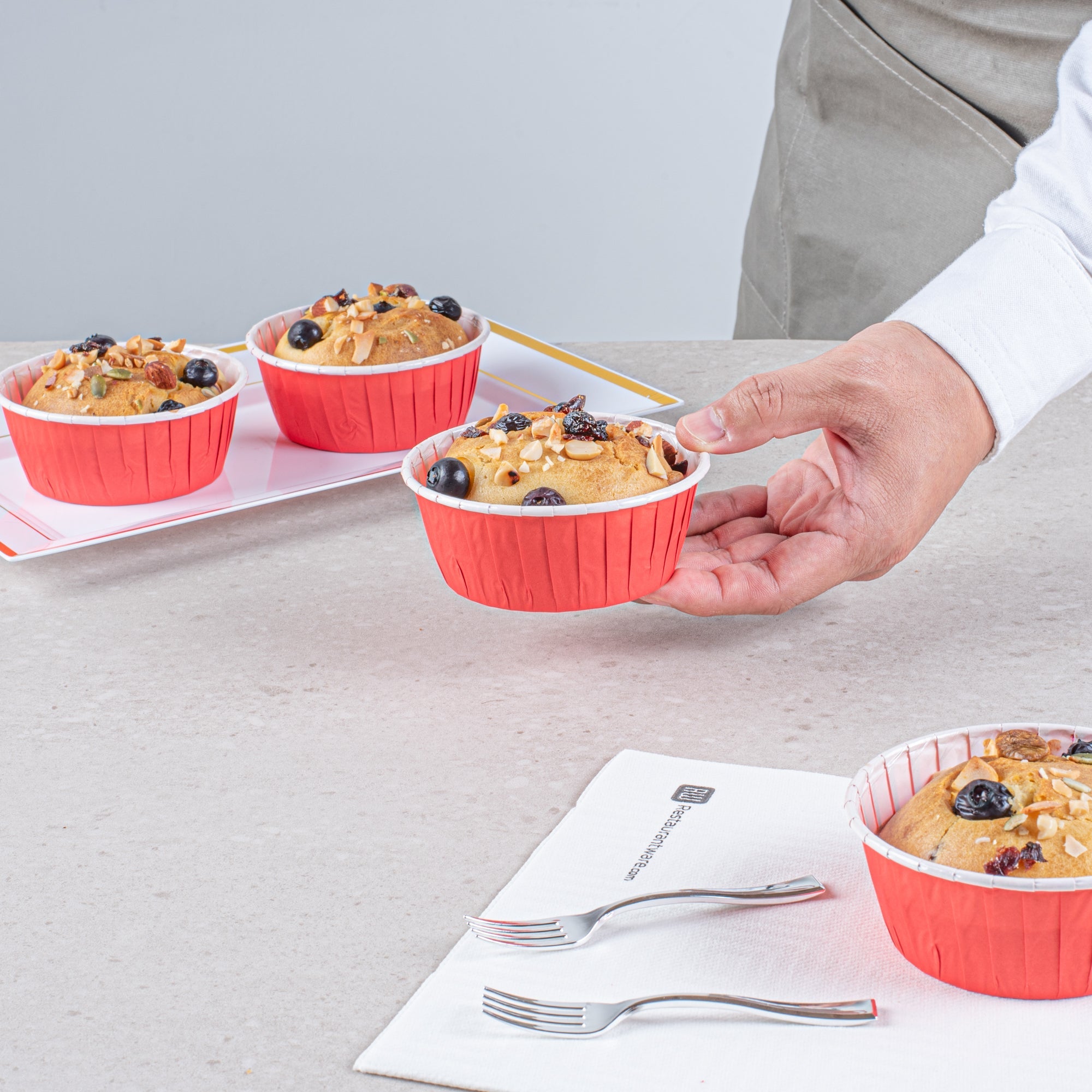 Panificio 5 oz Round Red Paper Large Baking Cup - Pleated - 3 3/4" x 3 3/4" x 1 1/2" - 200 count box