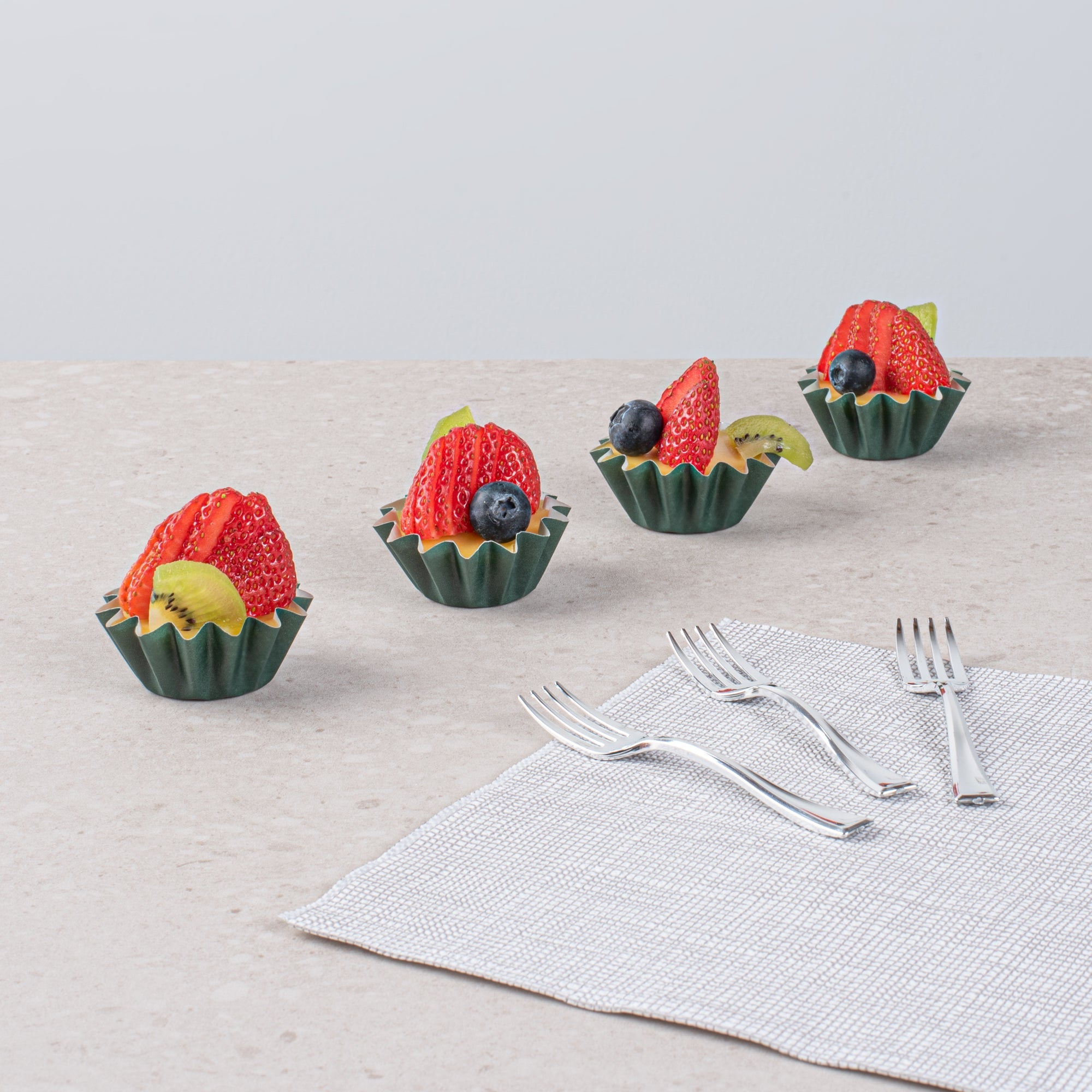 Panificio 0.4 oz Forest Green Floral Paper Mini Baking Cup - Flared - 2" x 2" x 1/2" - 200 count box