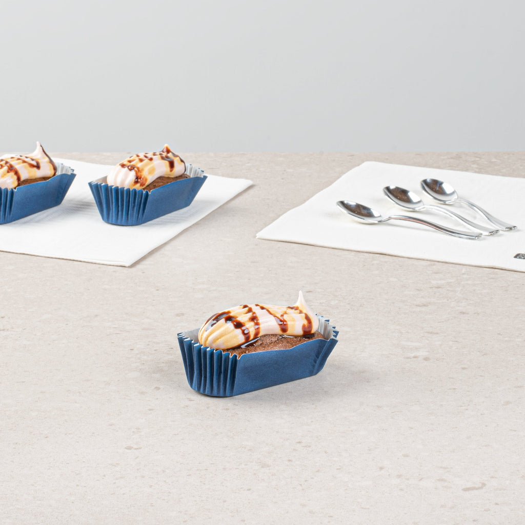 Panificio 1 oz Elliptical Midnight Blue Paper Regular Baking Cup - Ridged - 3 1/2" x 1 1/2" x 3/4" - 200 count box