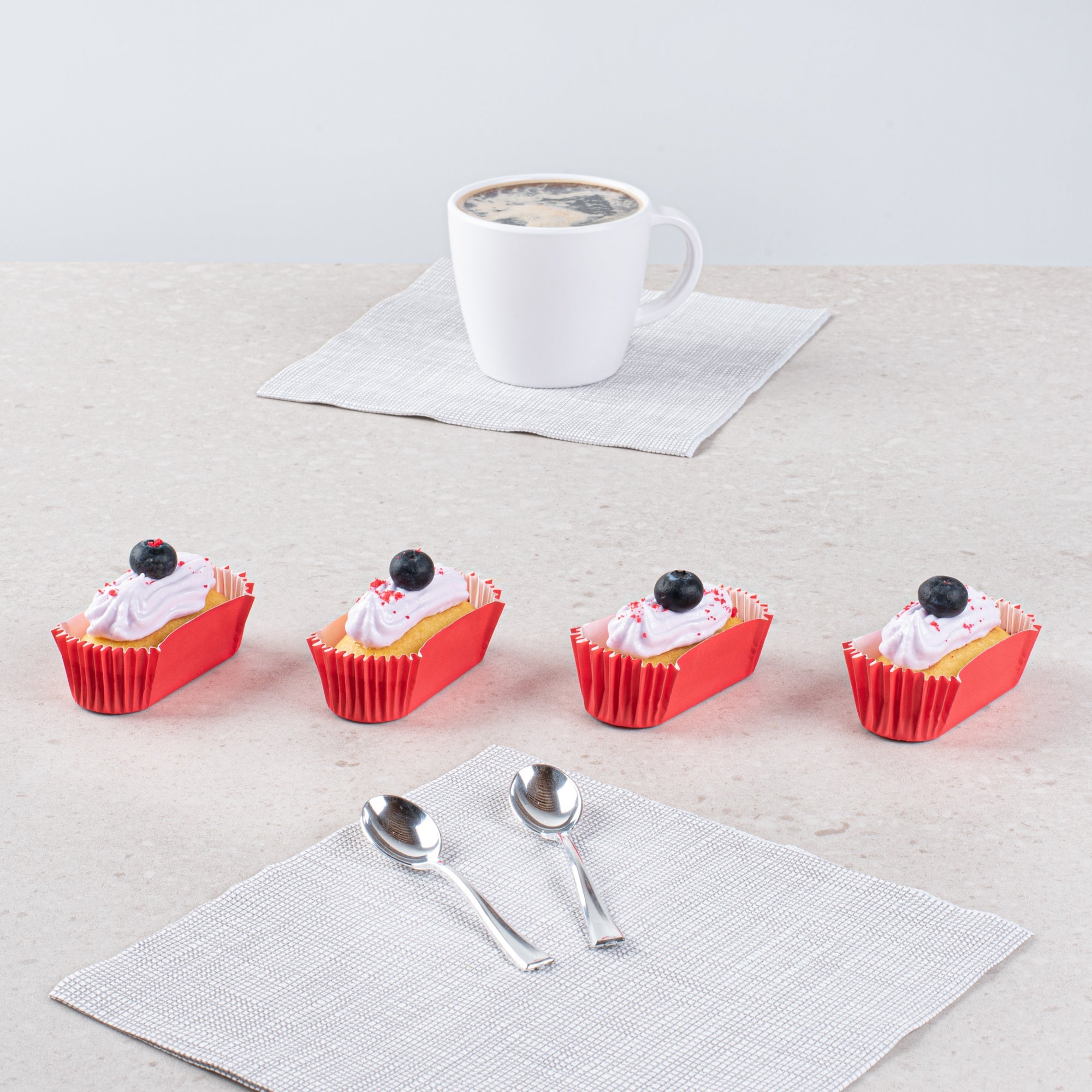 Panificio 1 oz Elliptical Red Paper Regular Baking Cup - Ridged - 3 1/2" x 1 1/2" x 3/4" - 200 count box