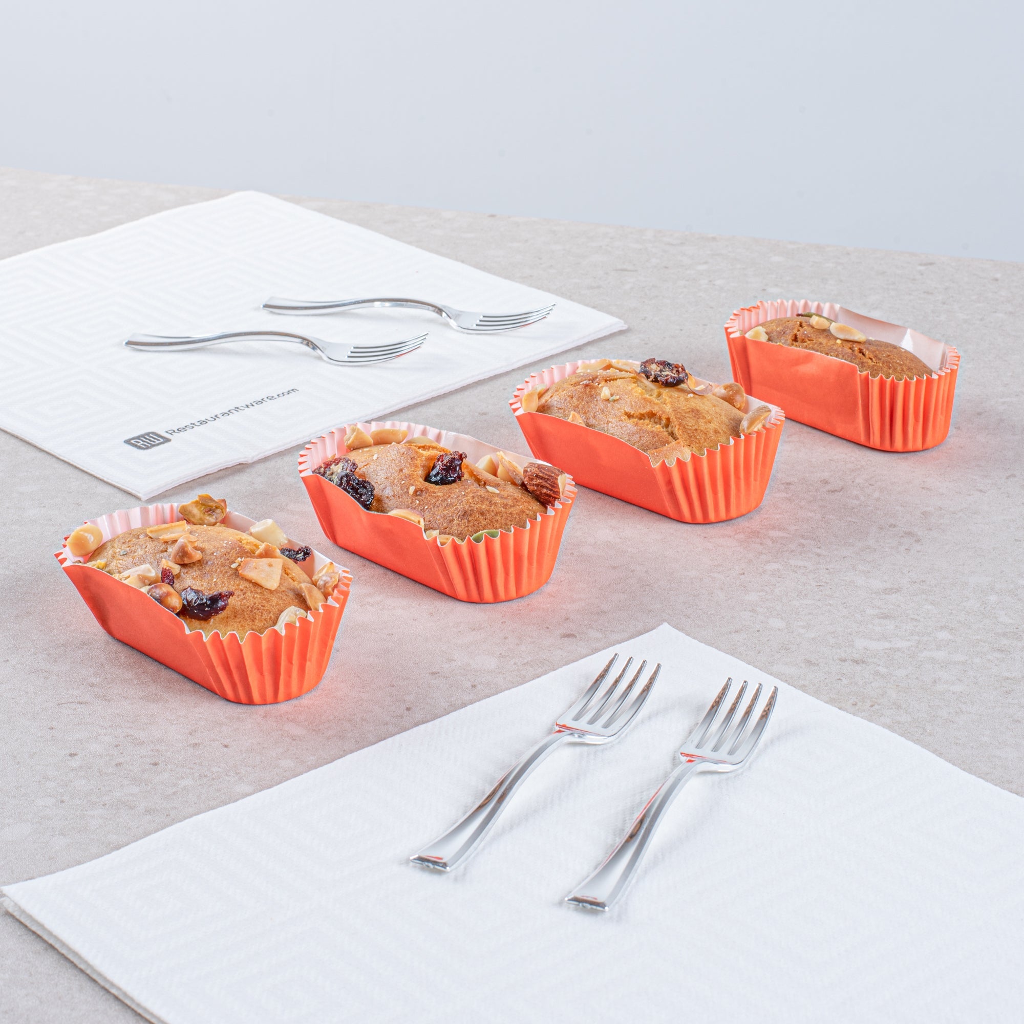 Panificio 1 oz Elliptical Tangerine Orange Paper Regular Baking Cup - Ridged - 3 1/2" x 1 1/2" x 3/4" - 200 count box