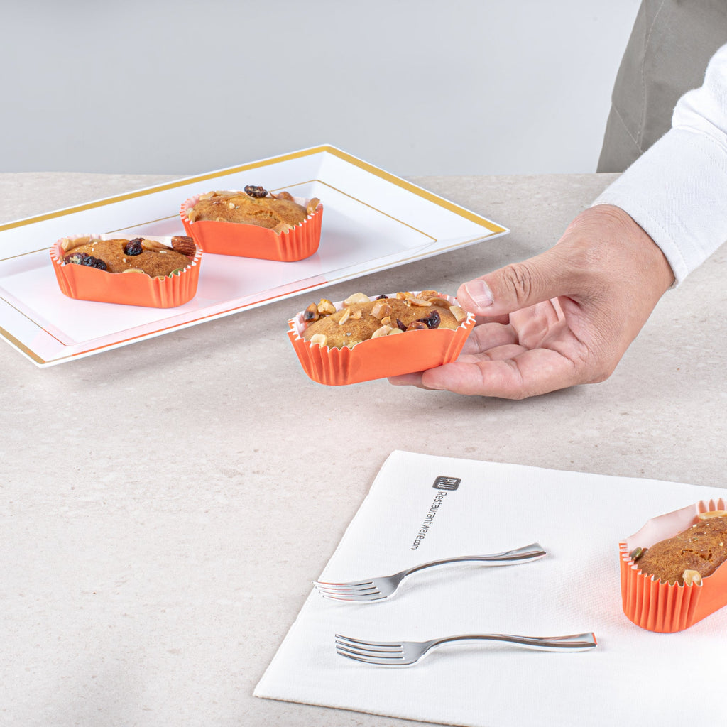 Panificio 1 oz Elliptical Tangerine Orange Paper Regular Baking Cup - Ridged - 3 1/2" x 1 1/2" x 3/4" - 200 count box