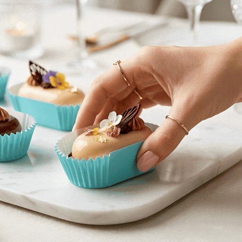 Panificio 1 oz Elliptical Turquoise Paper Regular Baking Cup - Ridged - 3 1/2" x 1 1/2" x 3/4" - 200 count box