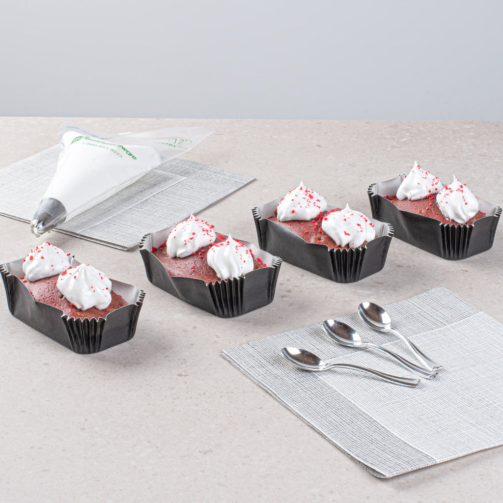 Panificio 5 oz Elliptical Black Paper Large Baking Cup - Ridged - 4 1/2" x 2 1/2" x 1 1/4" - 200 count box