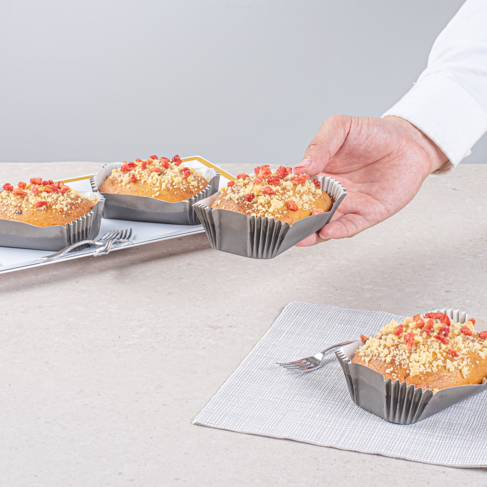 Panificio 5 oz Elliptical Gray Paper Large Baking Cup - Ridged - 4 1/2" x 2 1/2" x 1 1/4" - 200 count box