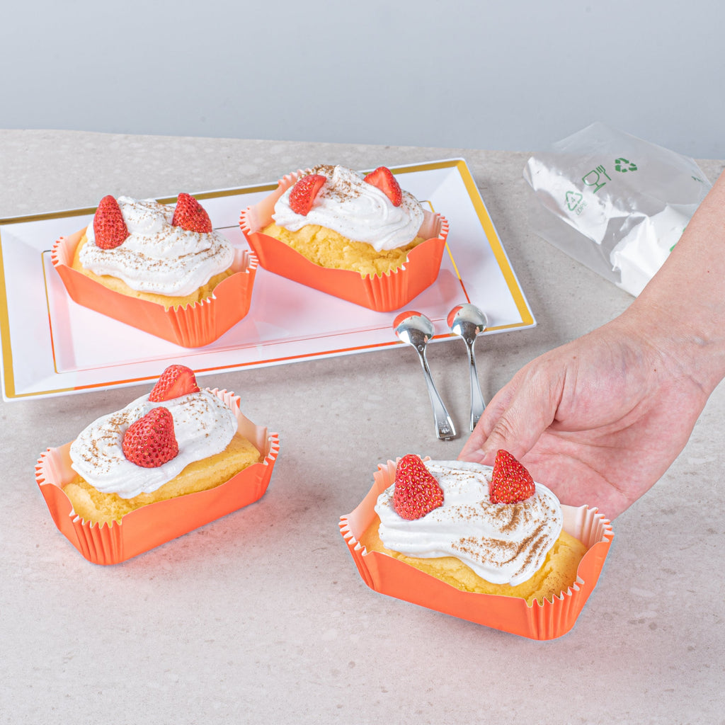 Panificio 5 oz Elliptical Tangerine Orange Paper Large Baking Cup - Ridged - 4 1/2" x 2 1/2" x 1 1/4" - 200 count box