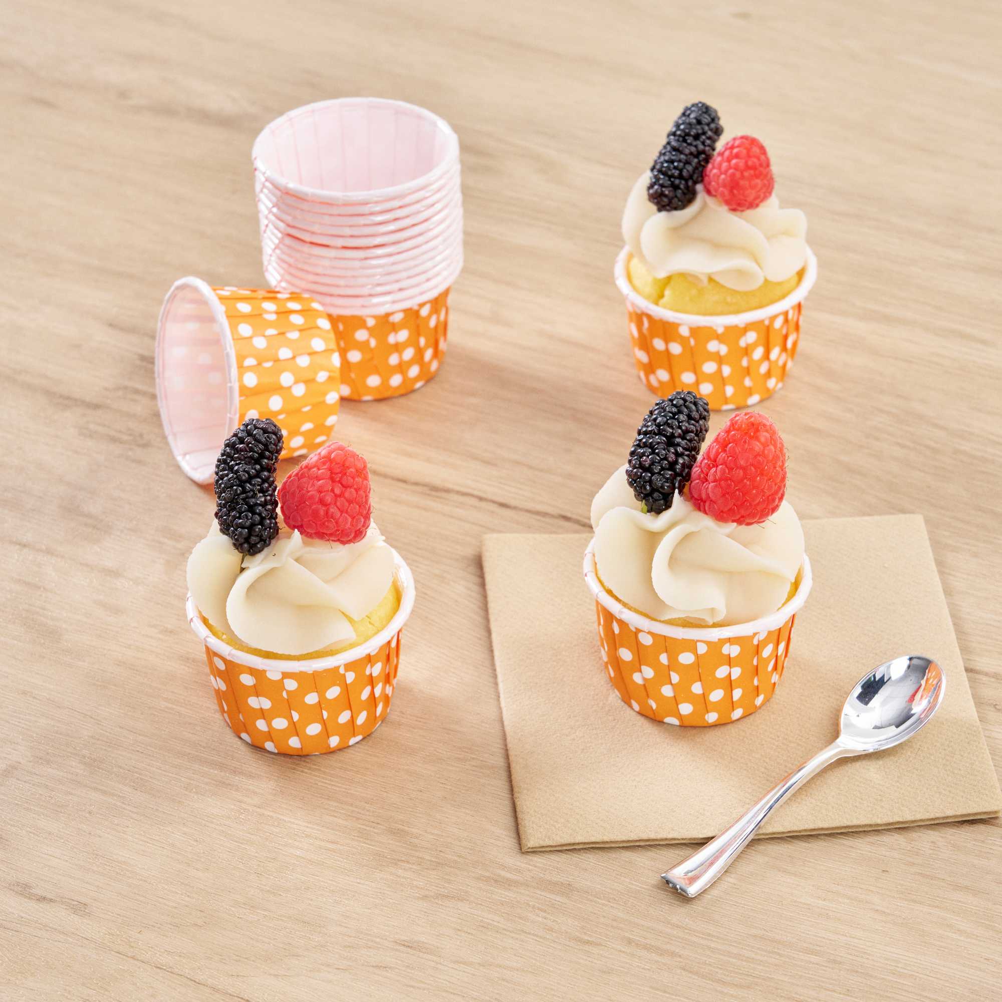 Panificio 2 oz Round Polka-Dotted Hot Orange Paper Medium Baking Cup - Pleated - 2 1/4" x 2 1/4" x 1 1/2" - 200 count box