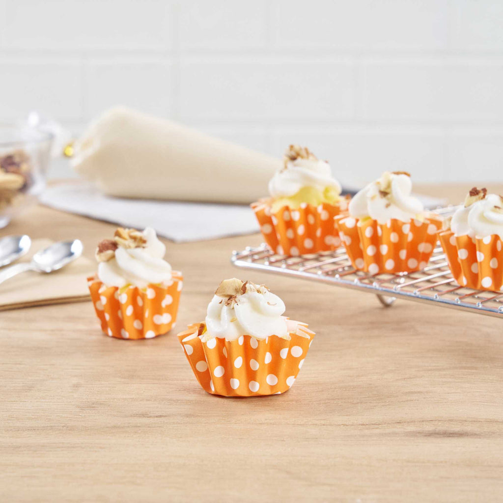 Panificio 0.4 oz Round Polka-Dotted Hot Orange Paper Mini Baking Cup - Flared - 2" x 2" x 1/2" - 200 count box