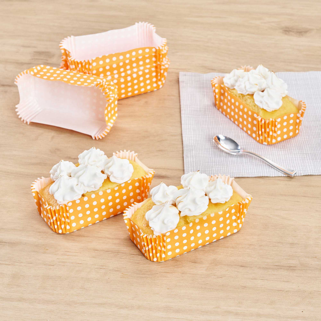 Panificio 5 oz Elliptical Polka-Dotted Hot Orange Paper Large Baking Cup - Ridged - 4 1/2" x 2 1/2" x 1 1/4" - 200 count box