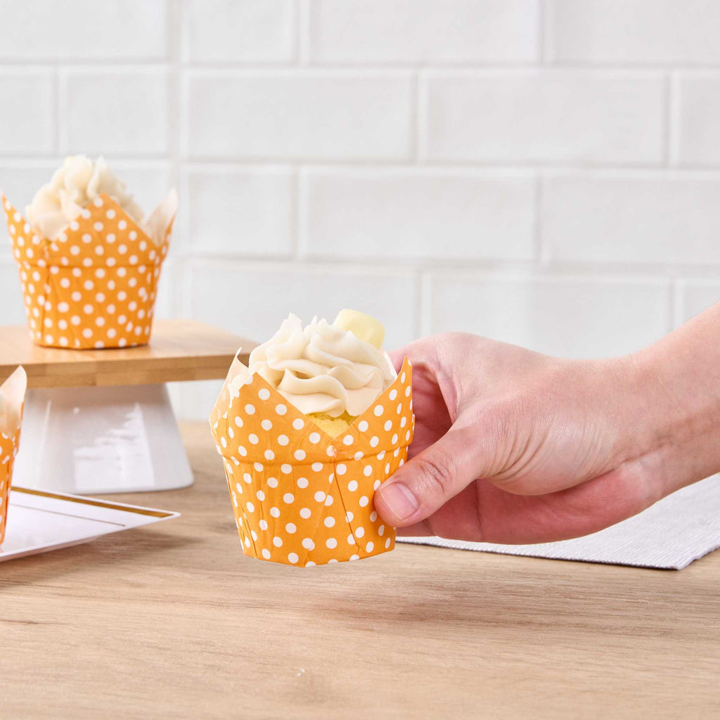 Panificio 1 oz Tulip Polka-Dotted Hot Orange Paper Regular Baking Cup - 3" x 3" x 3" - 200 count box