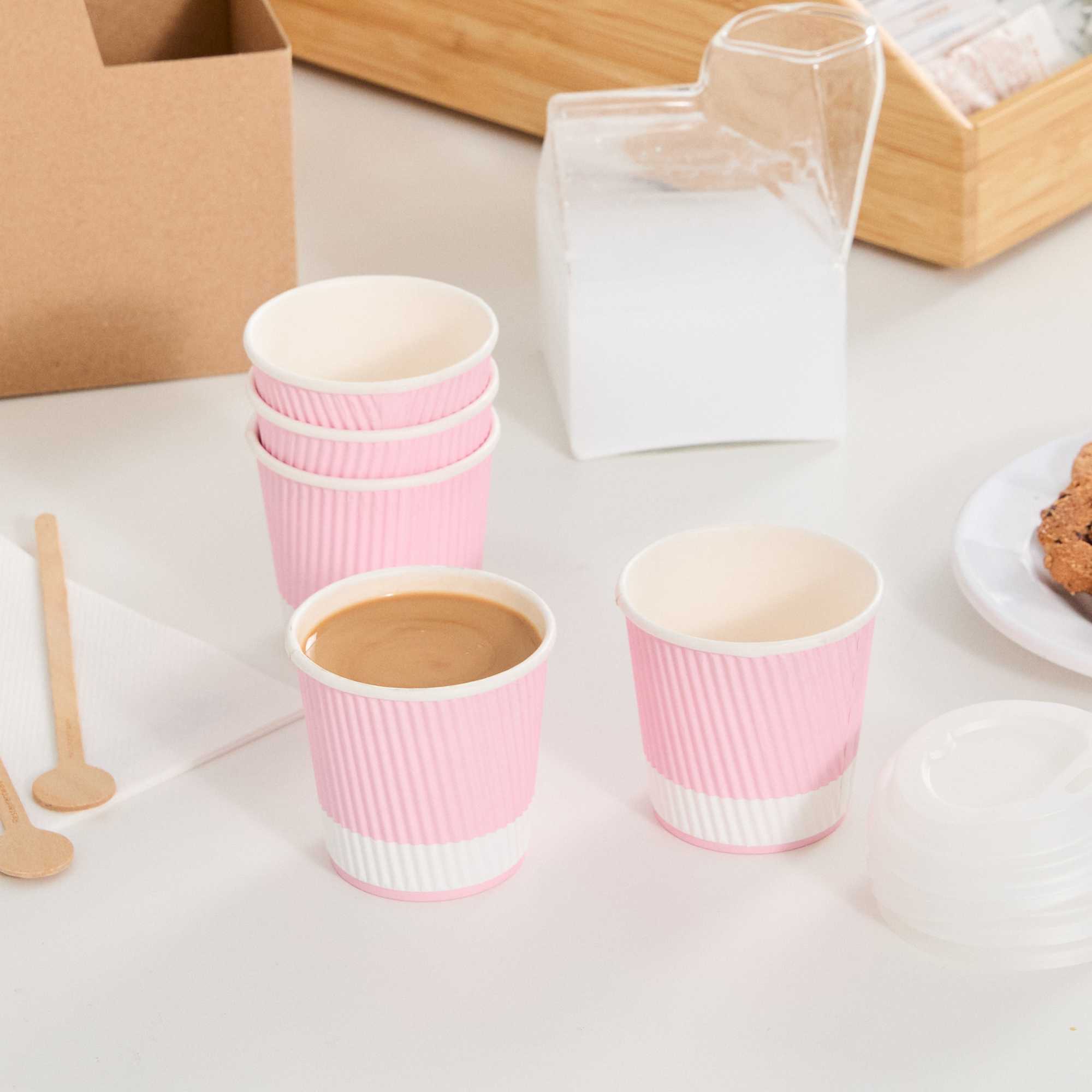 Restpresso 4 oz Light Pink Paper Coffee Cup - Ripple Wall - 2 1/2" x 2 1/2" x 2 1/4" - 25 count box