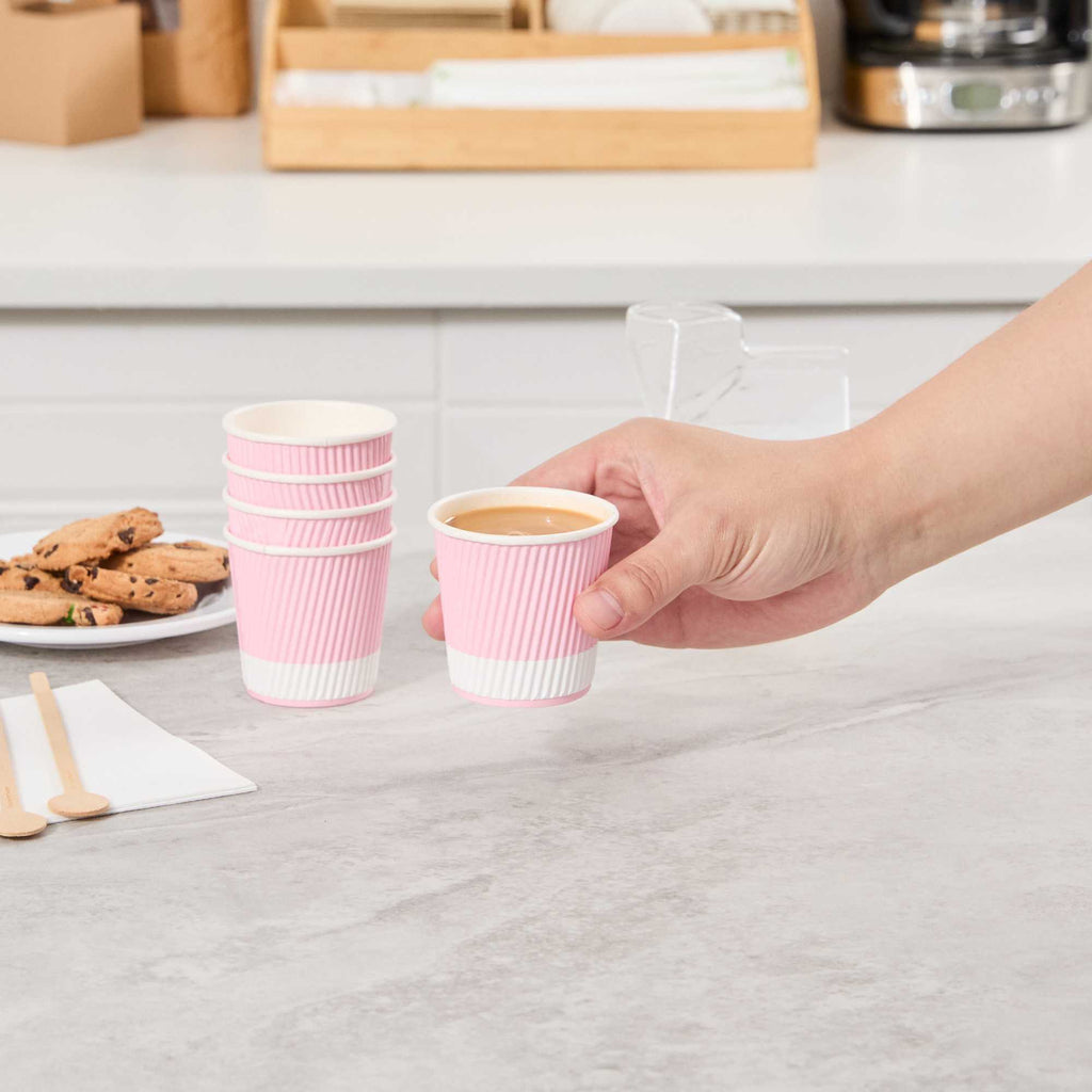 Restpresso 4 oz Light Pink Paper Coffee Cup - Ripple Wall - 2 1/2" x 2 1/2" x 2 1/4" - 25 count box