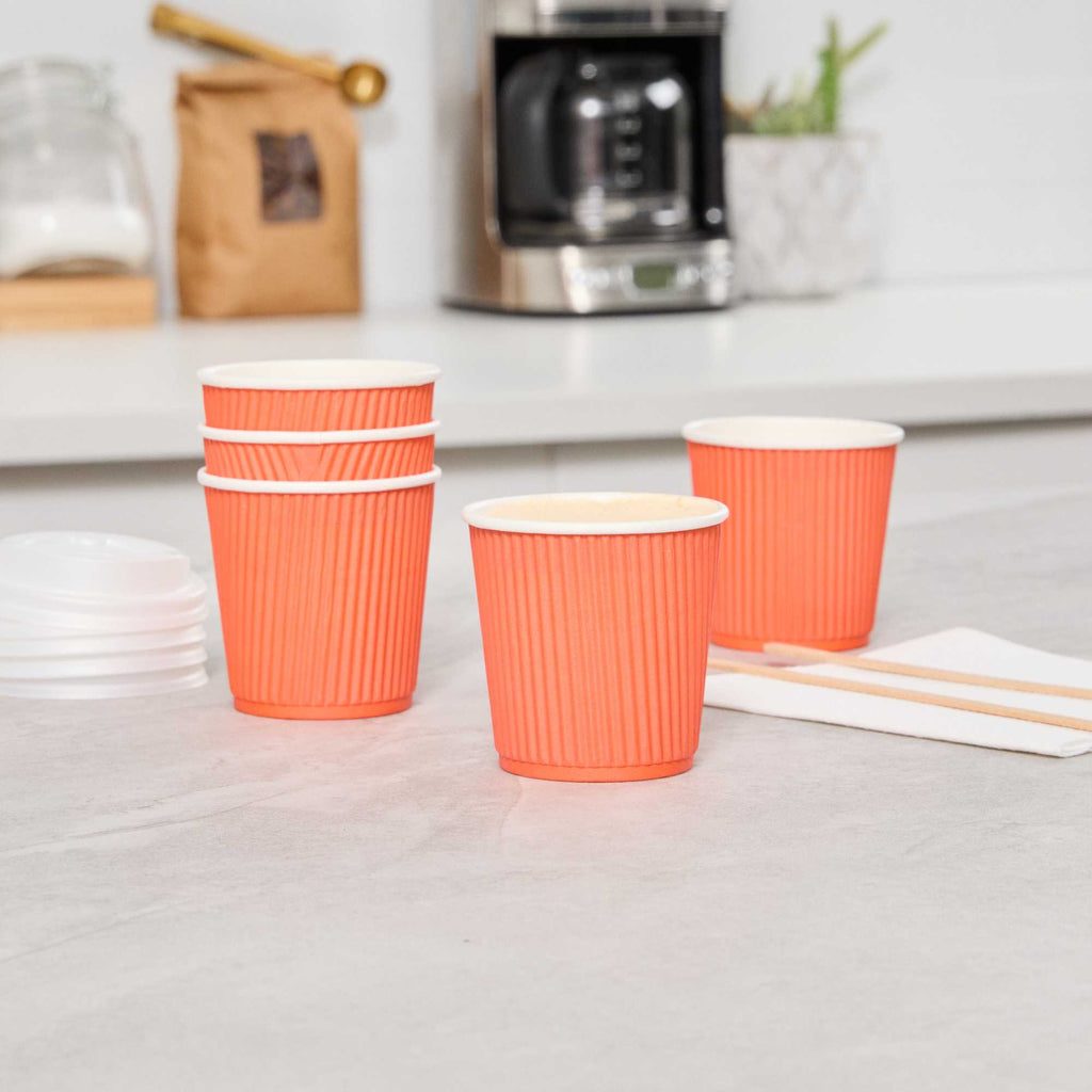 Restpresso 4 oz Tangerine Orange Paper Coffee Cup - Ripple Wall - 2 1/2" x 2 1/2" x 2 1/4" - 25 count box