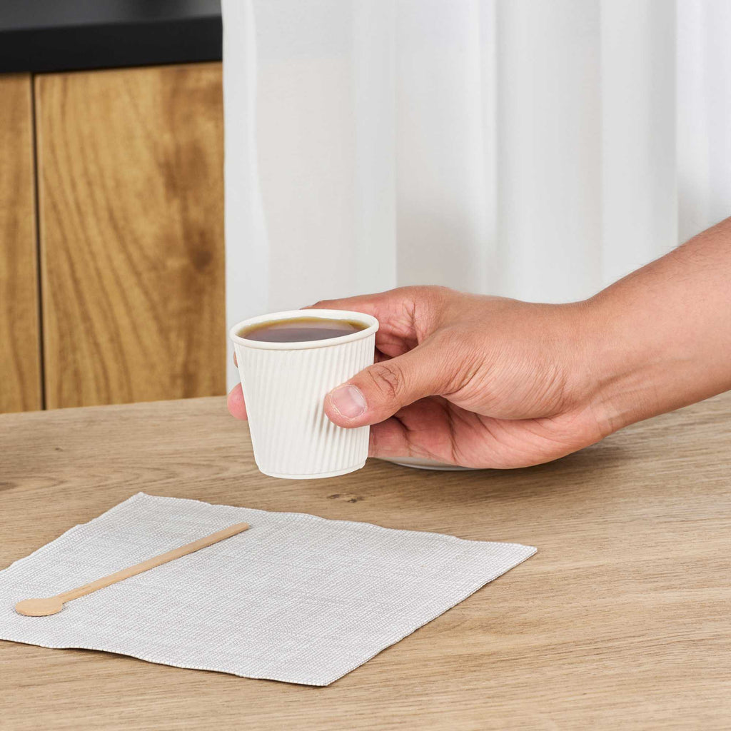 Restpresso 4 oz White Paper Coffee Cup - Ripple Wall - 2 1/2" x 2 1/2" x 2 1/4" - 25 count box