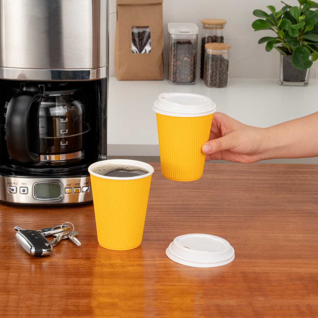 Restpresso 12 oz Yellow Paper Coffee Cup - Ripple Wall - 3 1/2" x 3 1/2" x 4 1/4" - 25 count box
