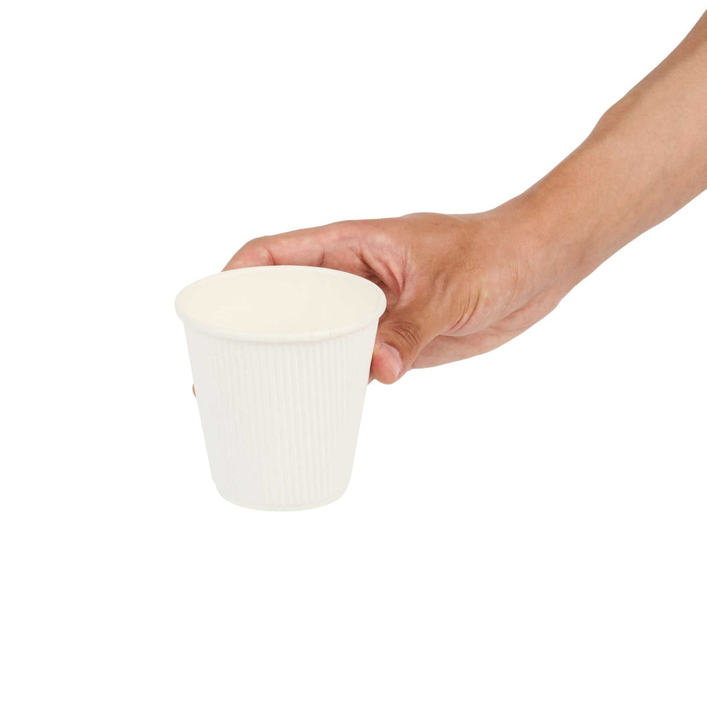 Restpresso 8 oz White Paper Coffee Cup - Ripple Wall - 3 1/2" x 3 1/2" x 3 1/4" - 25 count box