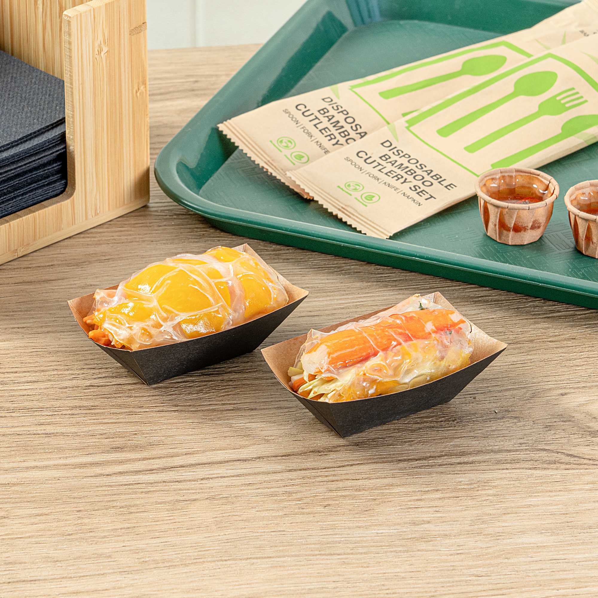 Bio Tek 2 oz Black Paper Food Tray / Boat - 3 1/4" x 2 1/4" x 1 1/4" - 50 count box