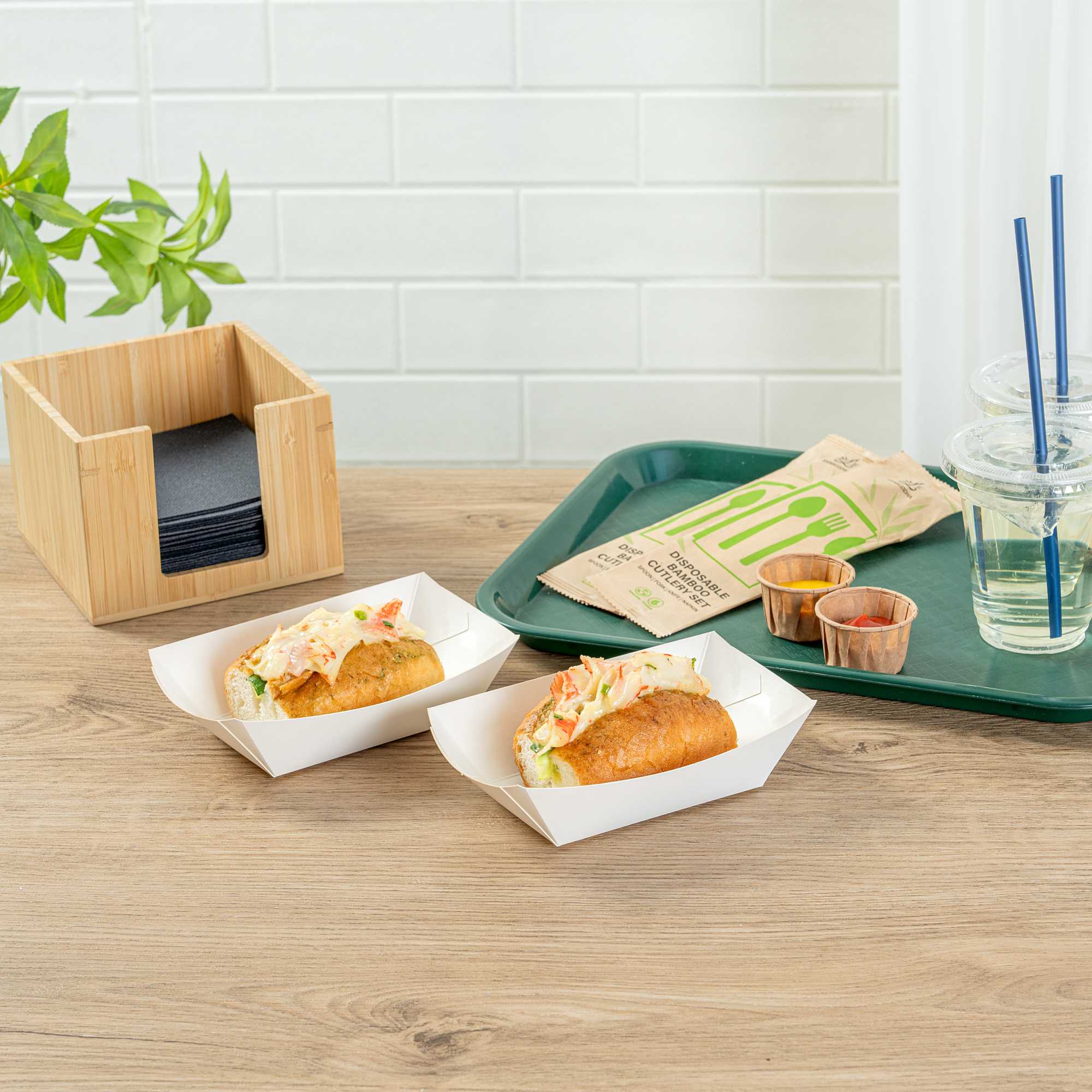 Bio Tek 1/2 lb White Paper #50 Food Tray / Boat - 4 1/4" x 2 3/4" x 1 1/2" - 400 count box
