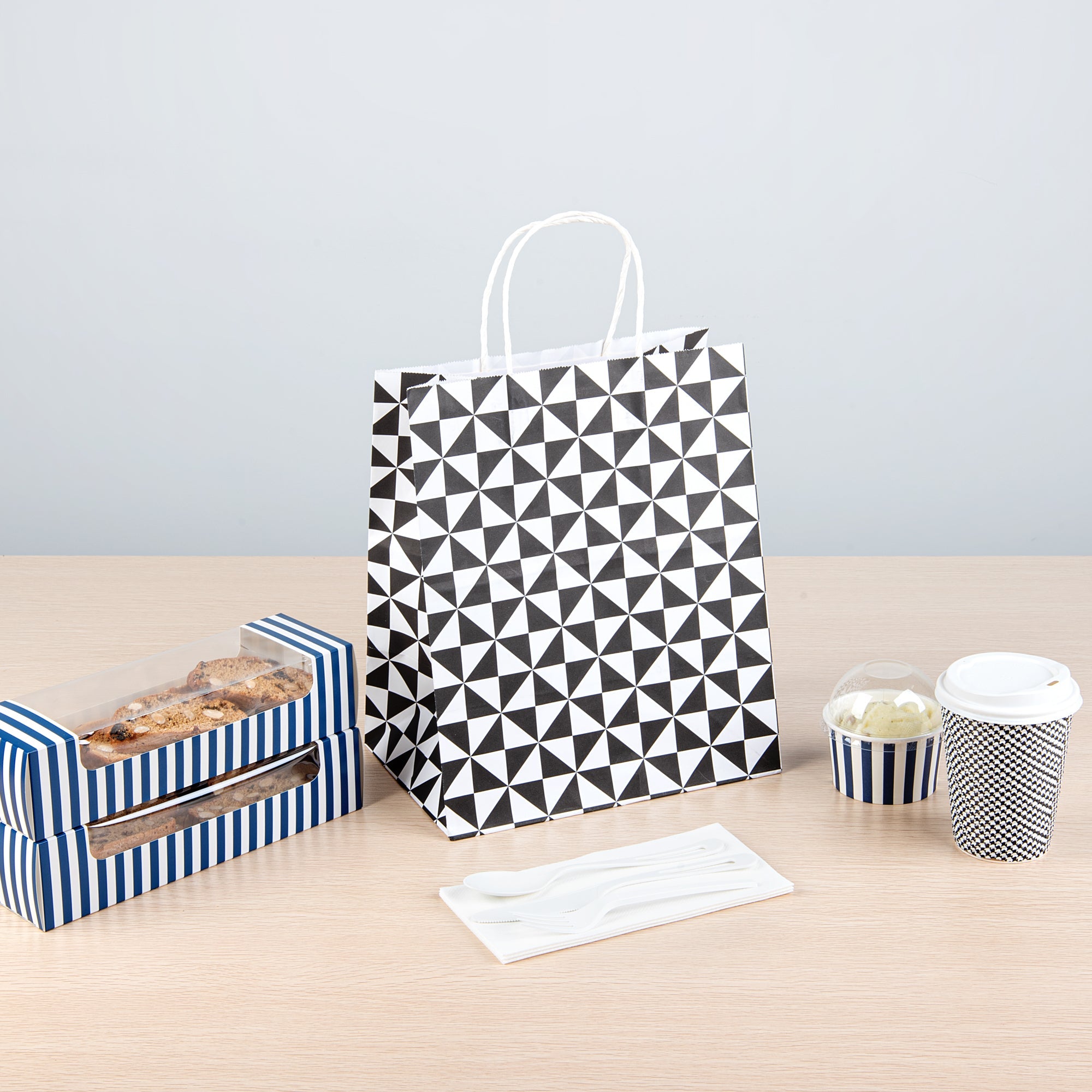 Vogue White Paper Medium Shopping Bag - Black Geo Print, with Handles - 10" x 6 3/4" x 12" - 100 count box