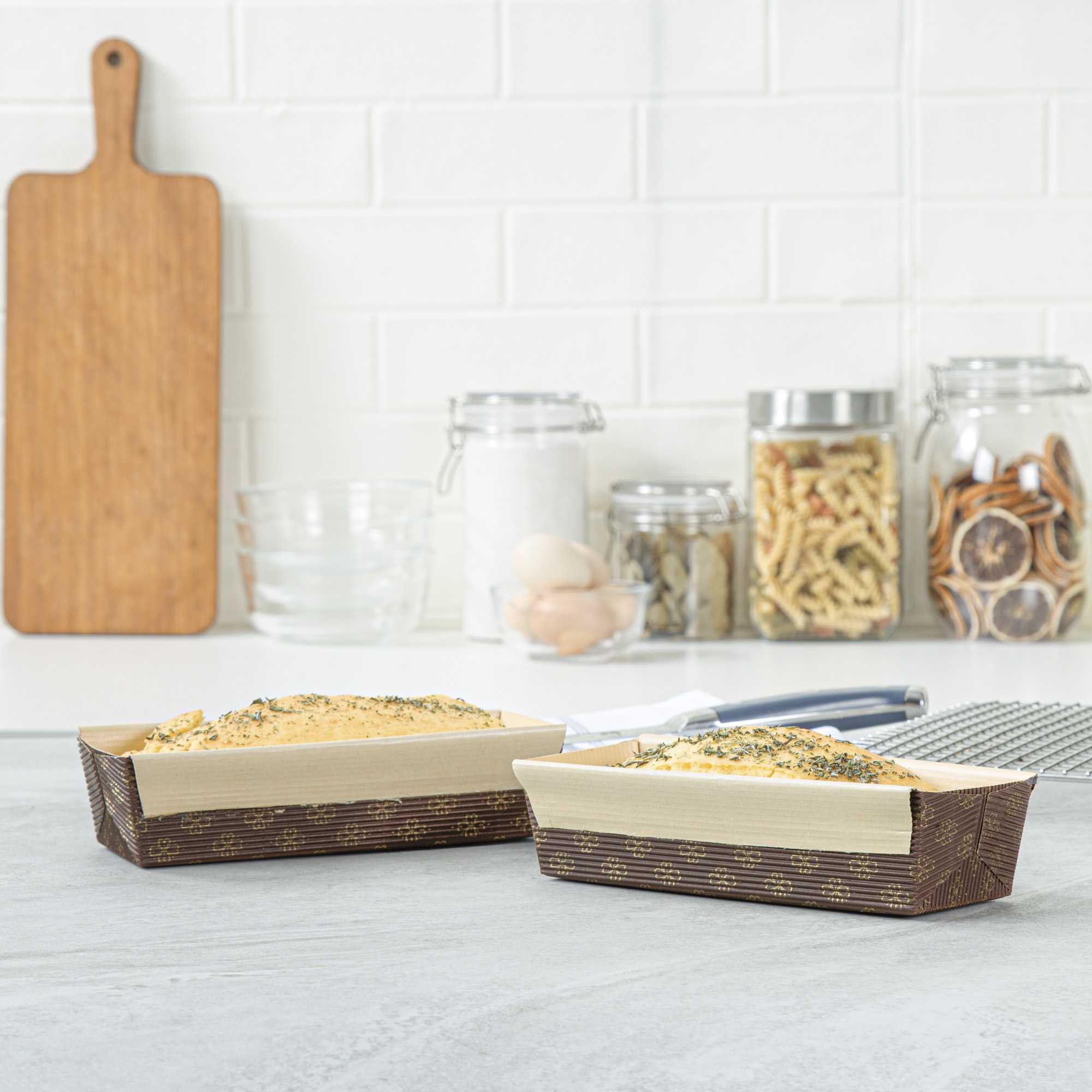 Panificio 18 oz Kraft Paper Baking Loaf Pan - Greaseproof, Rippled - 7 3/4" x 3 1/4" x 2" - 10 count box
