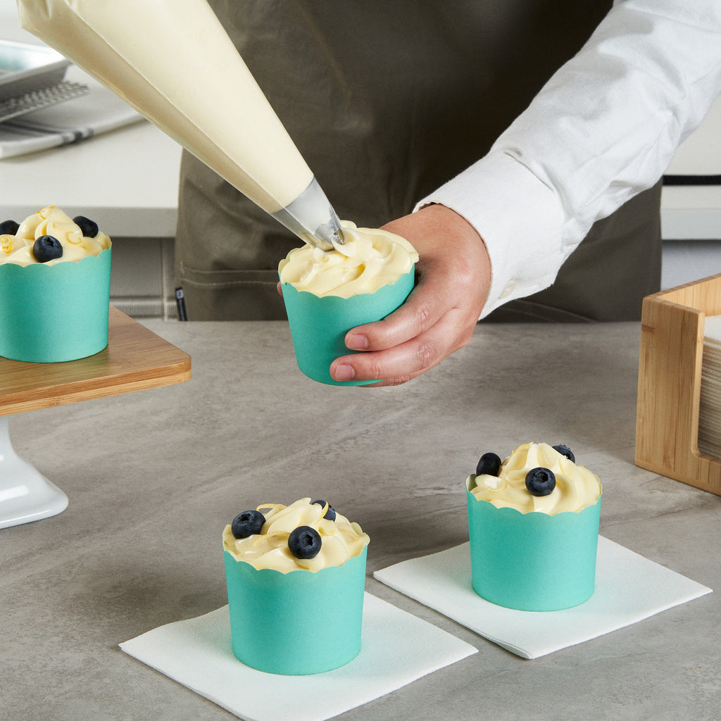 Panificio 6 oz Round Turquoise Paper Classic Baking Cup - Scalloped - 2 3/4" x 2 3/4" x 2 1/4" - 200 count box