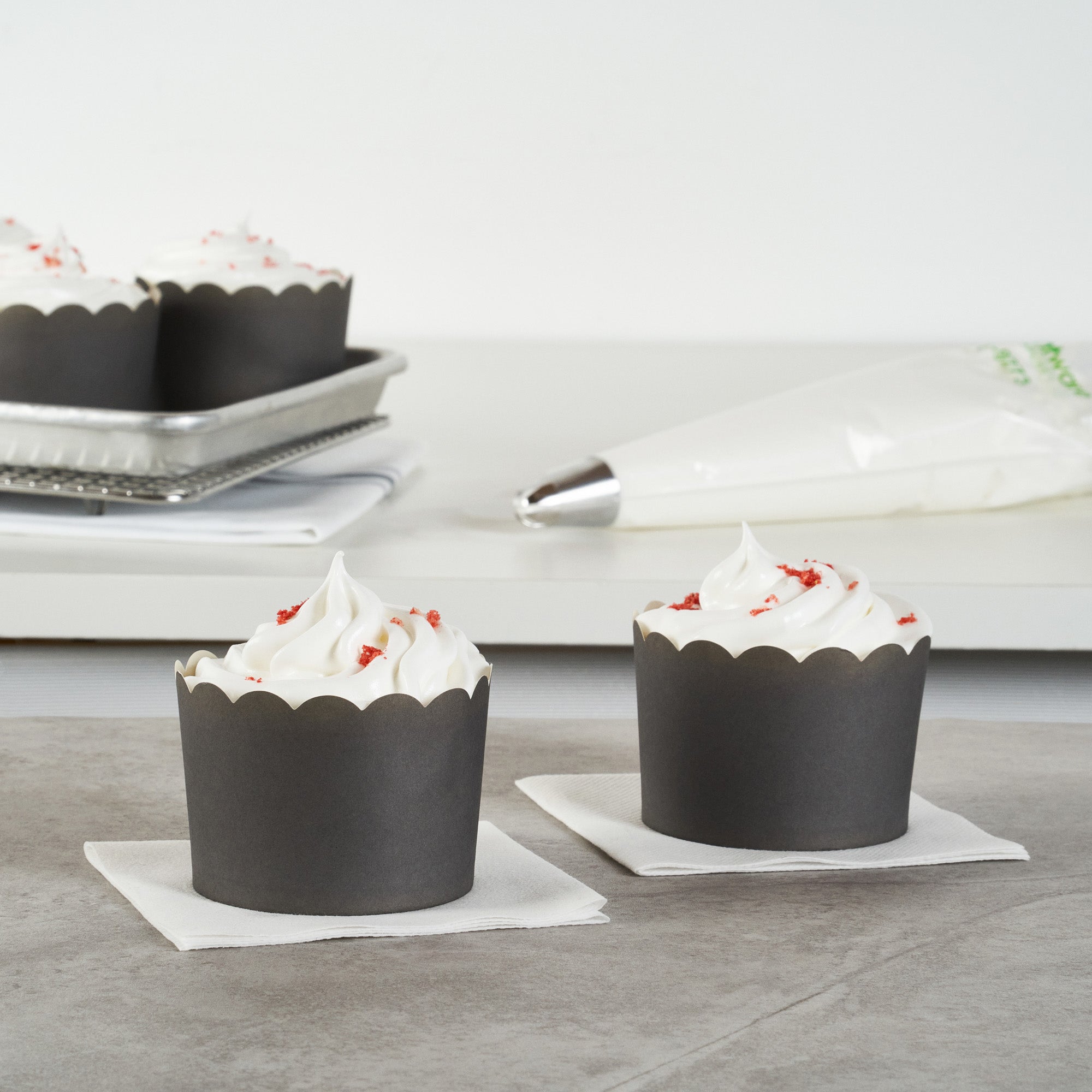 Panificio 10 oz Round Gray Paper Jumbo Baking Cup - Scalloped - 3 1/2" x 3 1/2" x 2 1/2" - 200 count box
