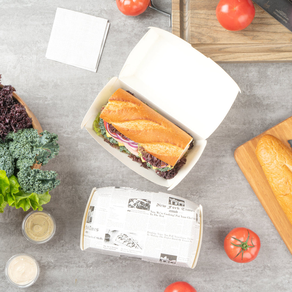 Bio Tek Rectangle Newsprint Paper Hot Dog / Sandwich Clamshell Container - 6 3/4" x 3 1/2" x 3 1/2" - 100 count box
