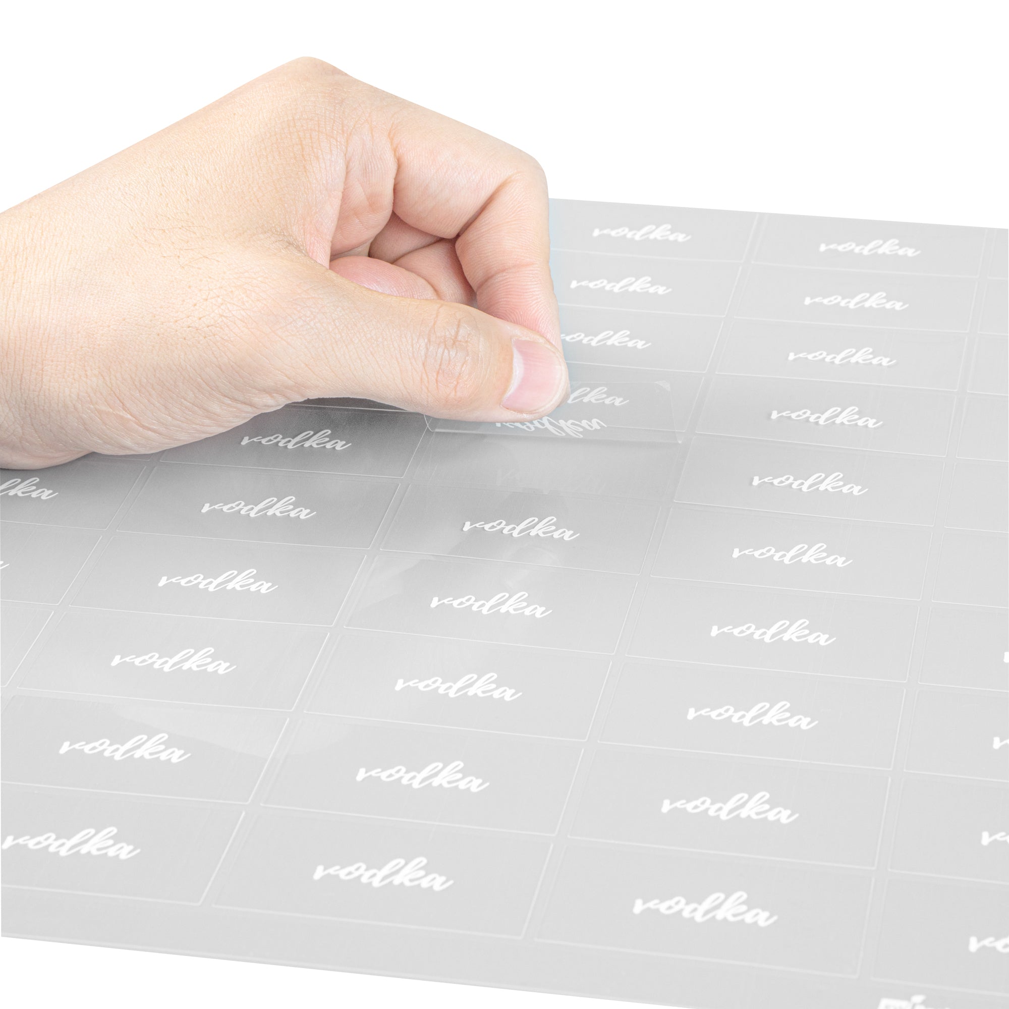 Label Tek Plastic Vodka Label - Clear with White Font, Water-Resistant - 2" x 1" - 100 count box