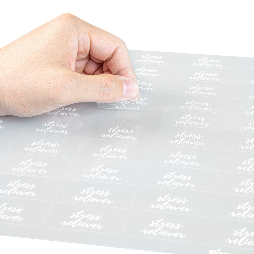 Label Tek Plastic Stress Reliever Label - Clear with White Font, Water-Resistant - 2" x 1" - 100 count box
