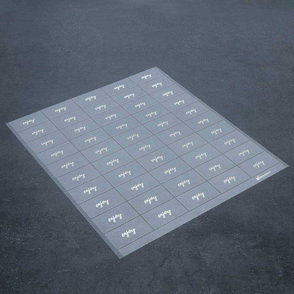 Label Tek Plastic Enjoy Label - Clear with White Font, Water-Resistant - 2" x 1" - 100 count box