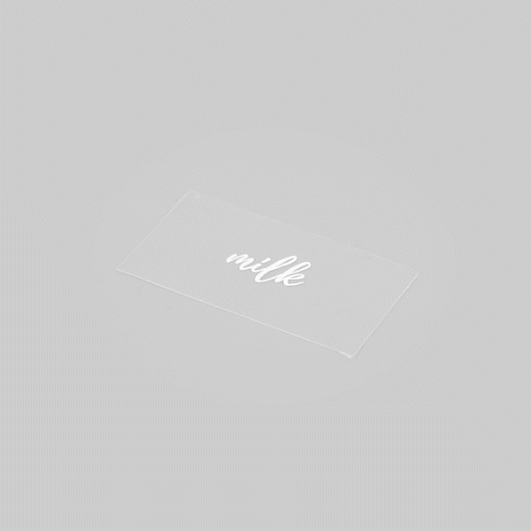 Label Tek Plastic Milk Label - Clear with White Font, Water-Resistant - 2" x 1" - 100 count box