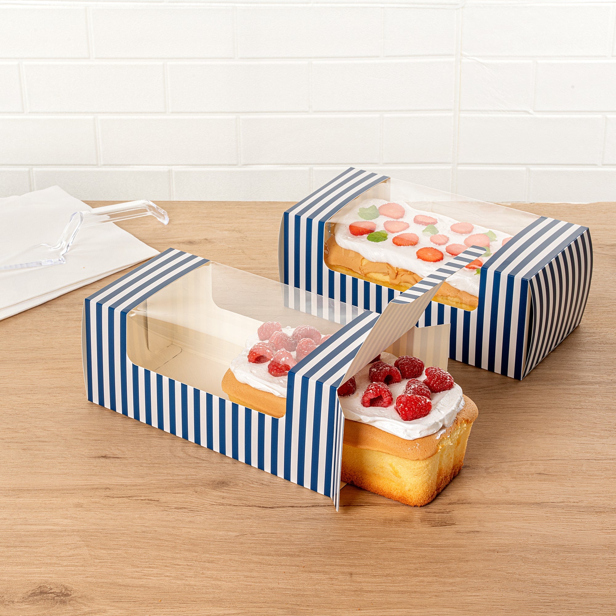 Pastry Tek Blue and White Stripe Paper Pastry / Cake Box - with Window - 9 3/4" x 4 3/4" x 4" - 100 count box