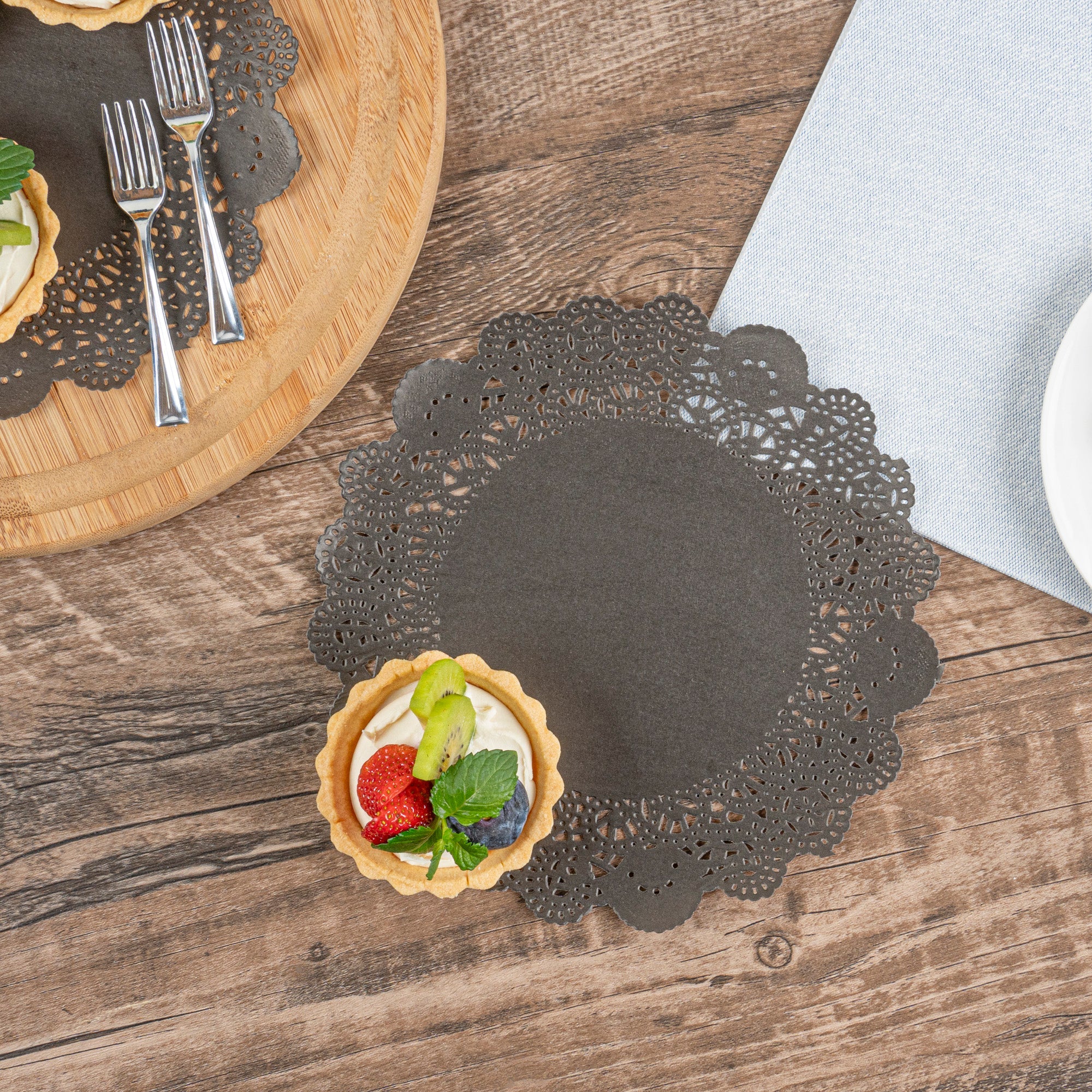 Pastry Tek Round Black Paper Doilies - Lace - 8" x 8" - 4000 count box