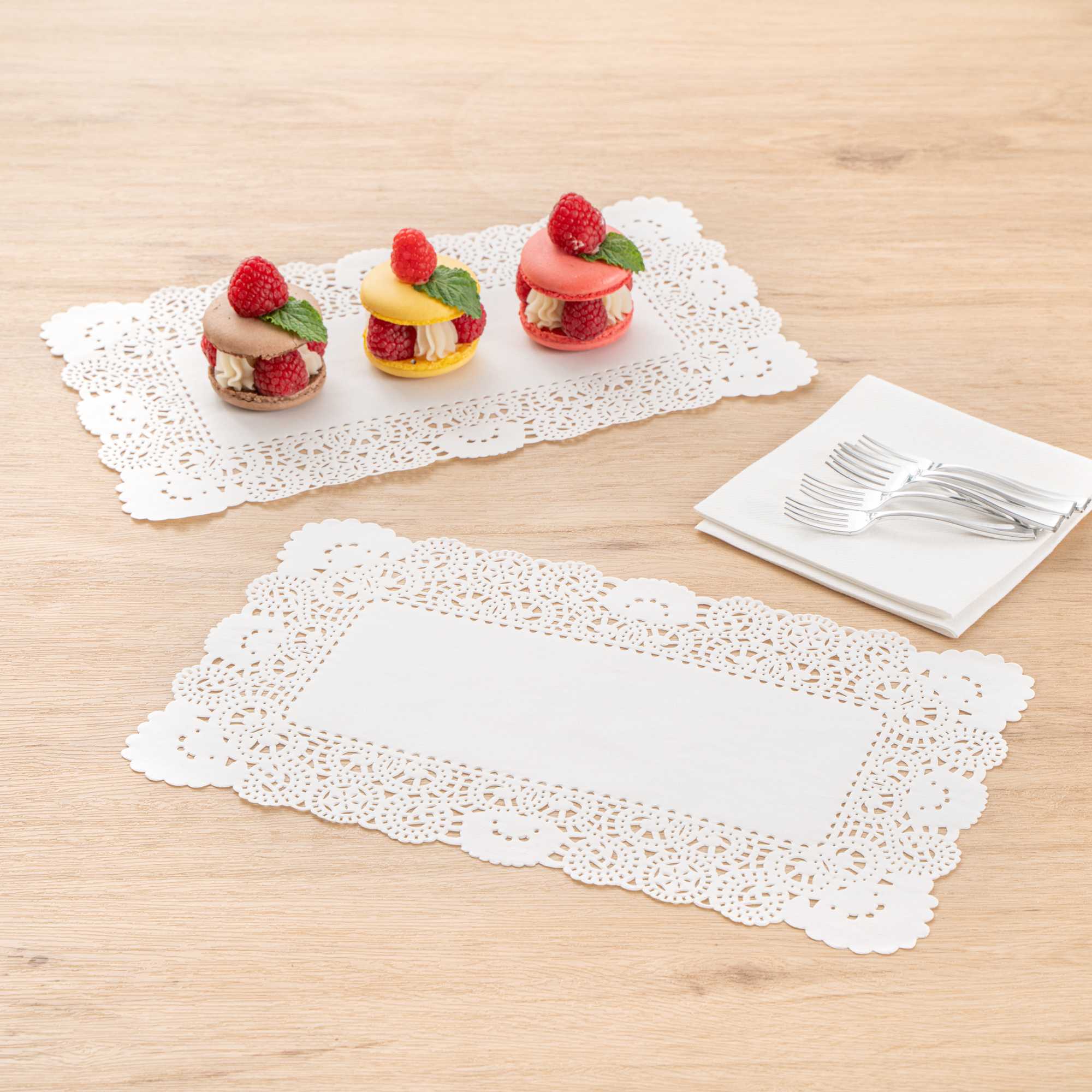 Pastry Tek Rectangle White Paper Doilies - Lace - 12" x 7" - 100 count box