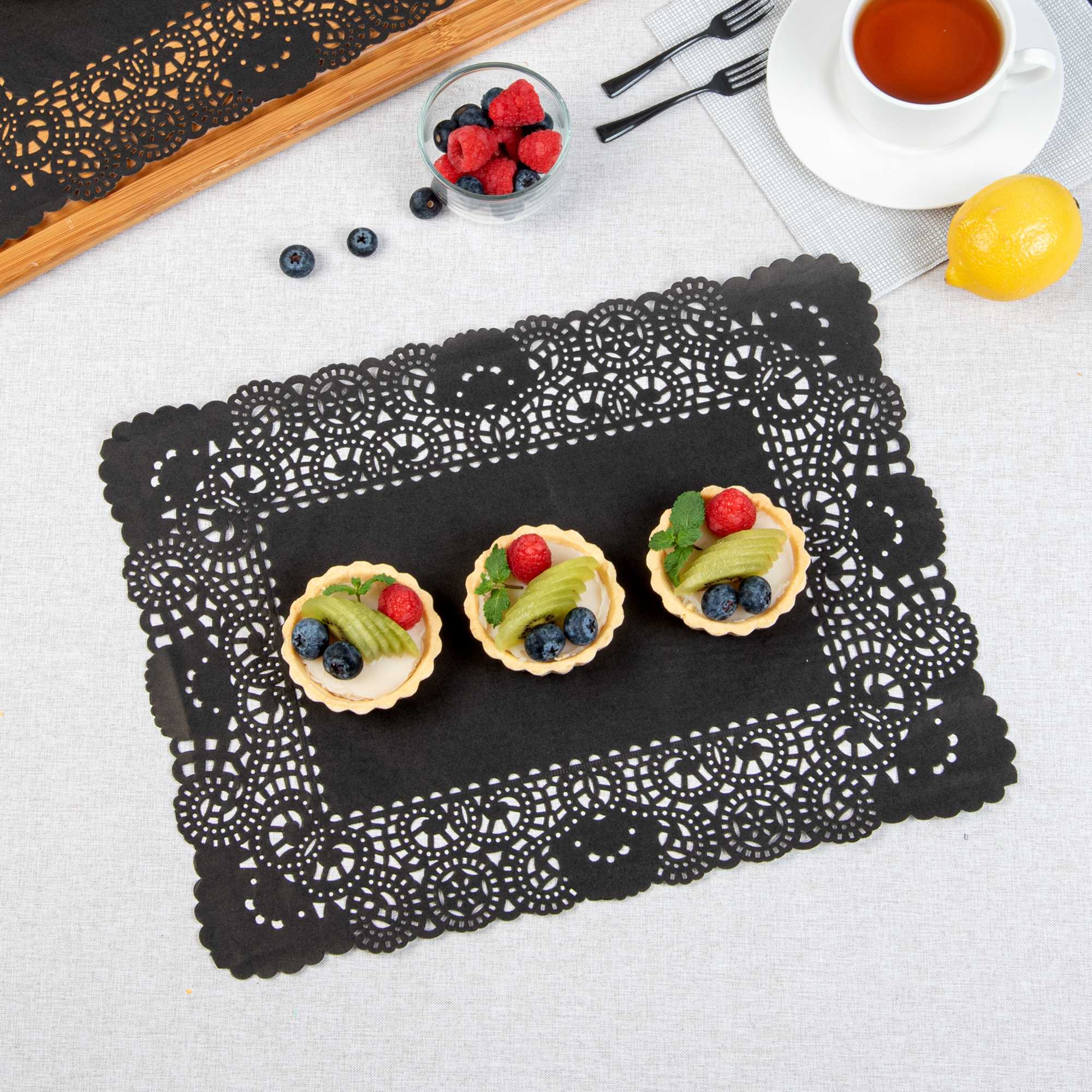 Pastry Tek Rectangle Black Paper Doilies - Lace - 15 3/4" x 12" - 4000 count box