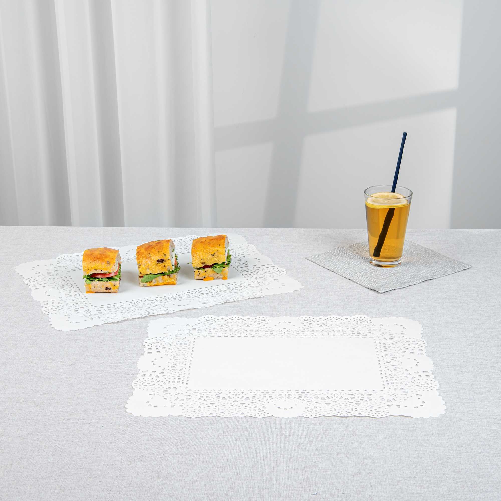 Pastry Tek Rectangle White Paper Doilies - Lace - 15 3/4" x 12" - 100 count box