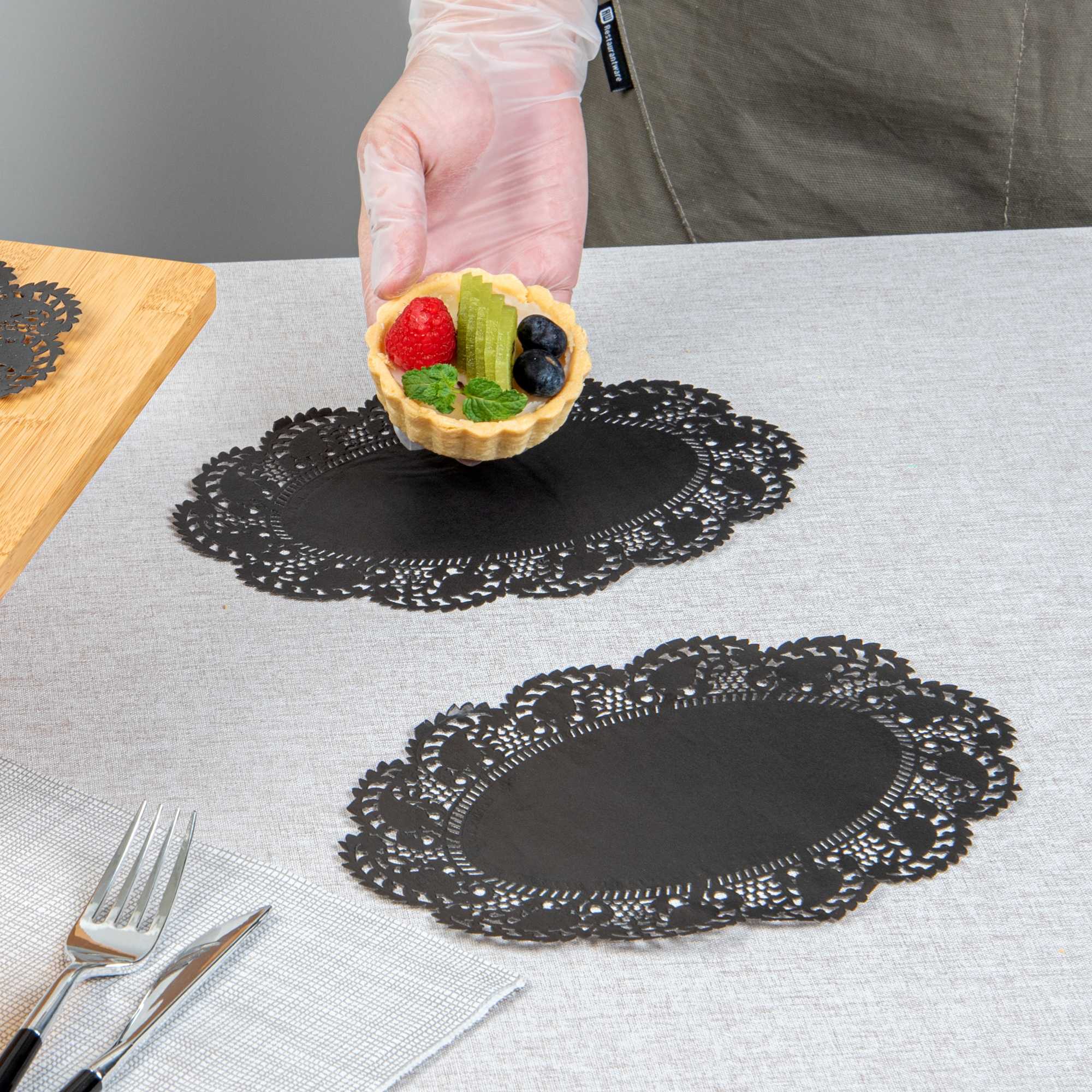 Pastry Tek Oval Black Paper Doilies - Lace - 9" x 6 1/2" - 4000 count box